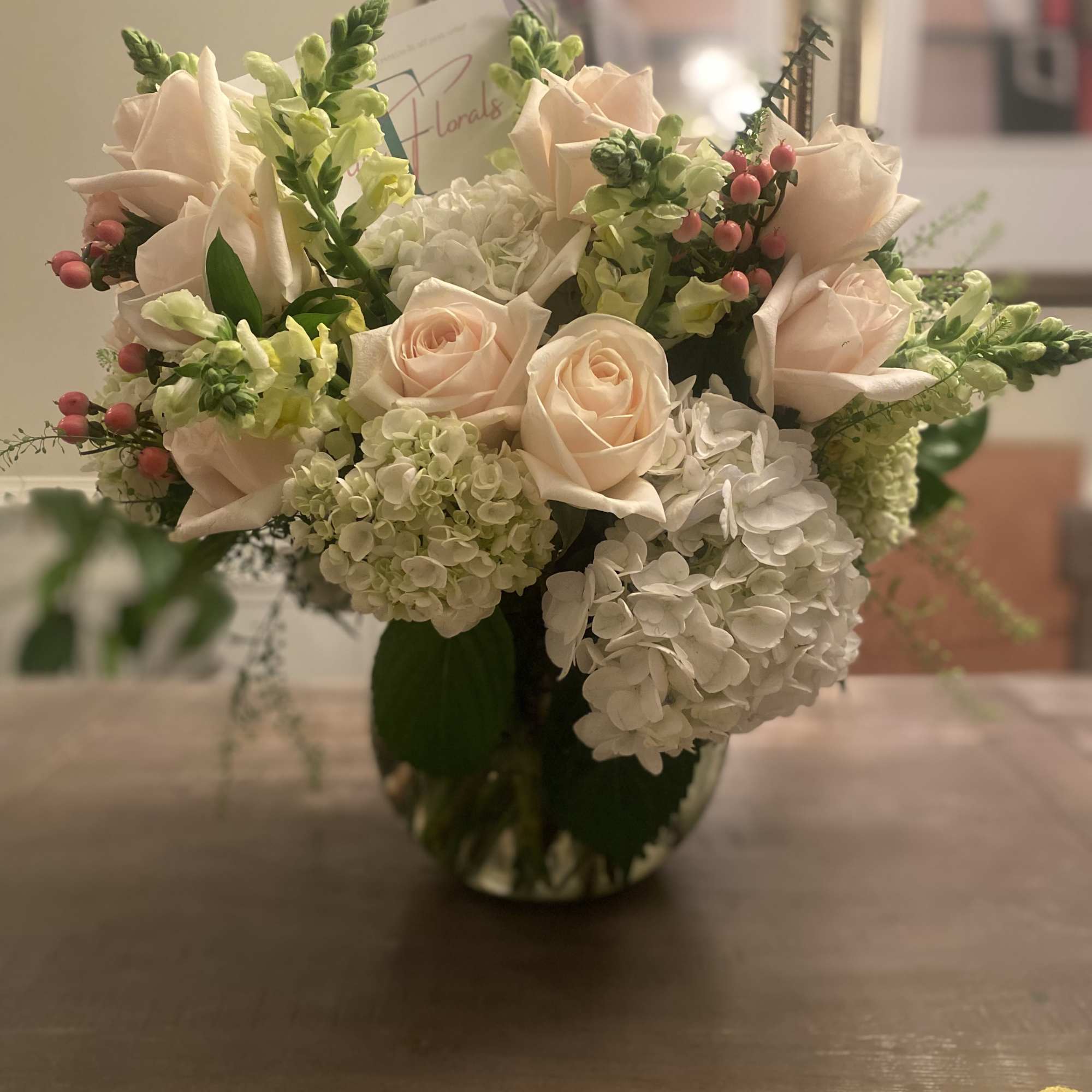 A luscious combination of hydrangeas & roses adorned with seasonal  blush A luscious combination of hydrangeas & roses adorned with seasonal  blush