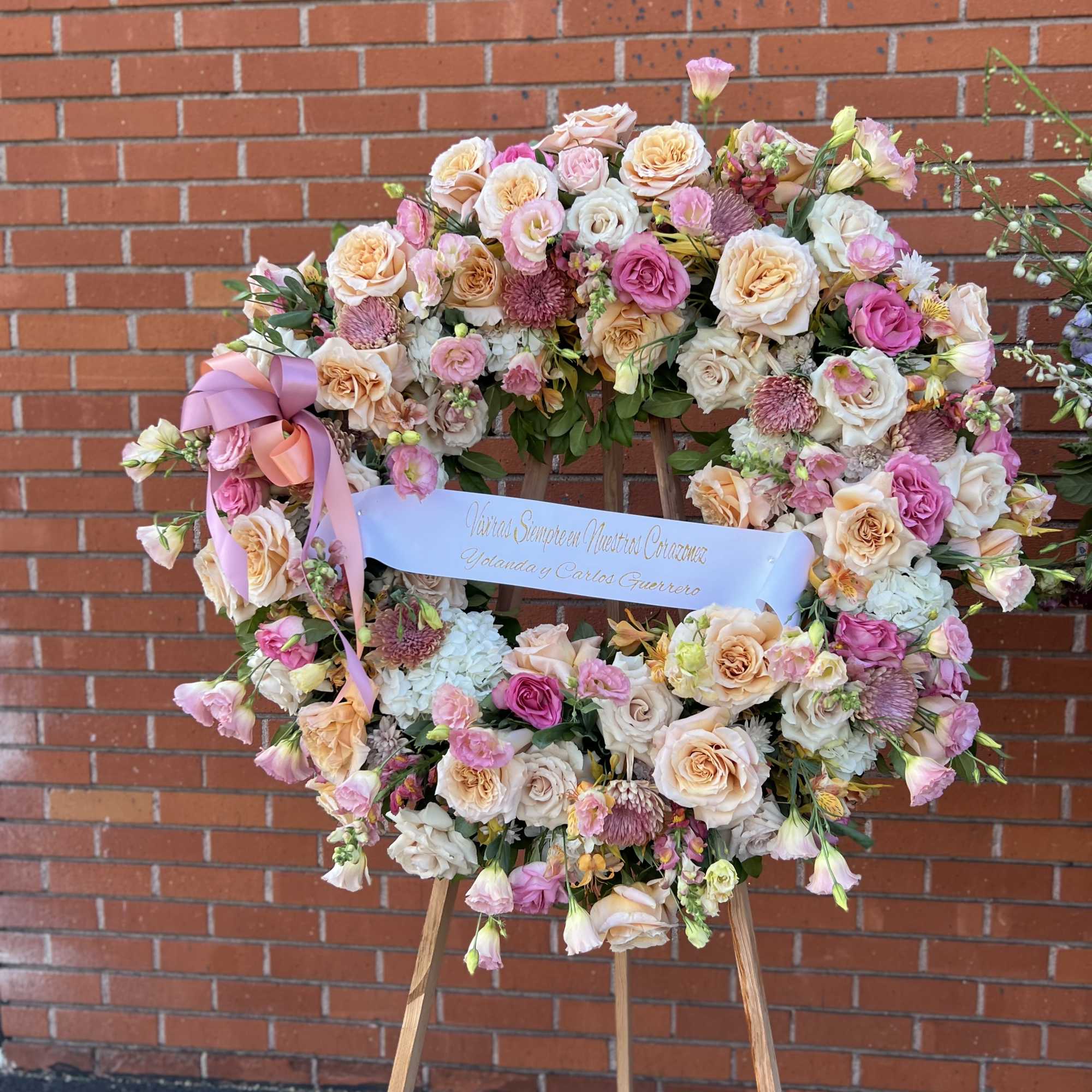 Arrangement with Peach, and a little White Flowers.
36&quot; Approx.