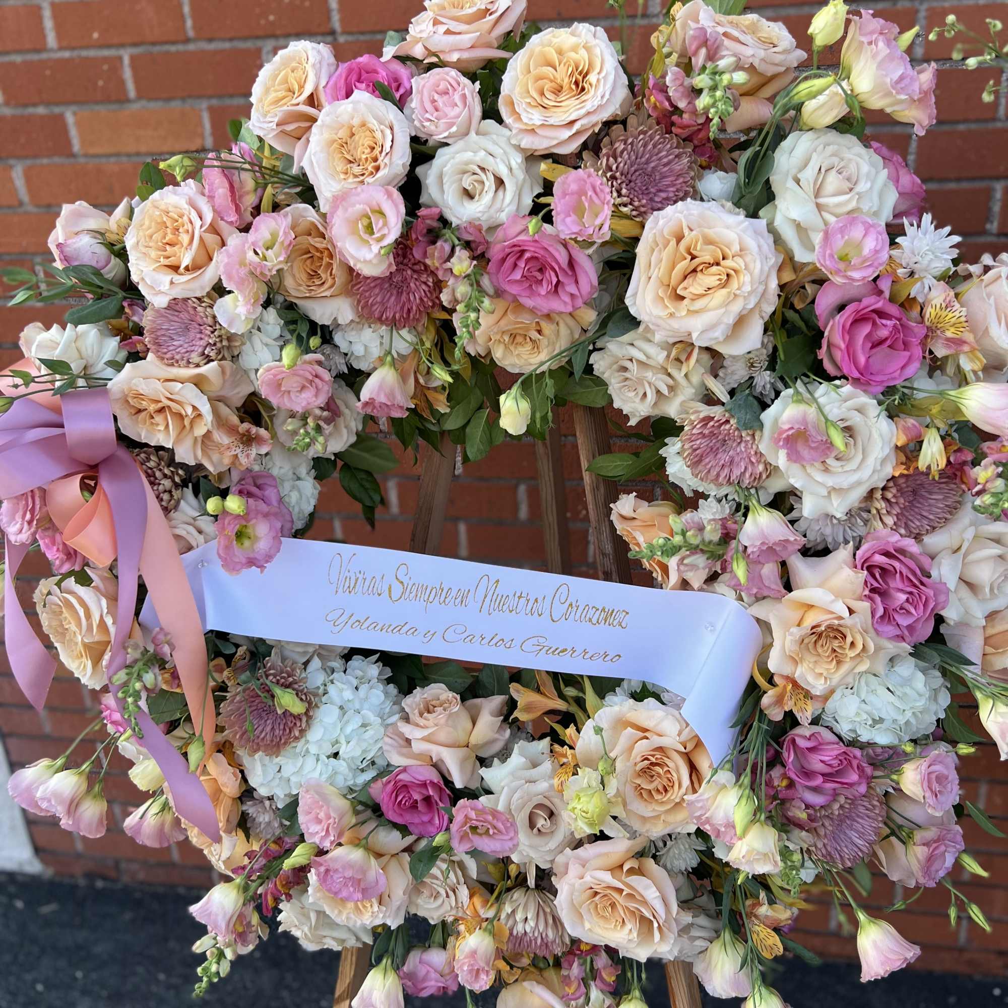 Arrangement with Peach, and a little White Flowers.
36&quot; Approx.