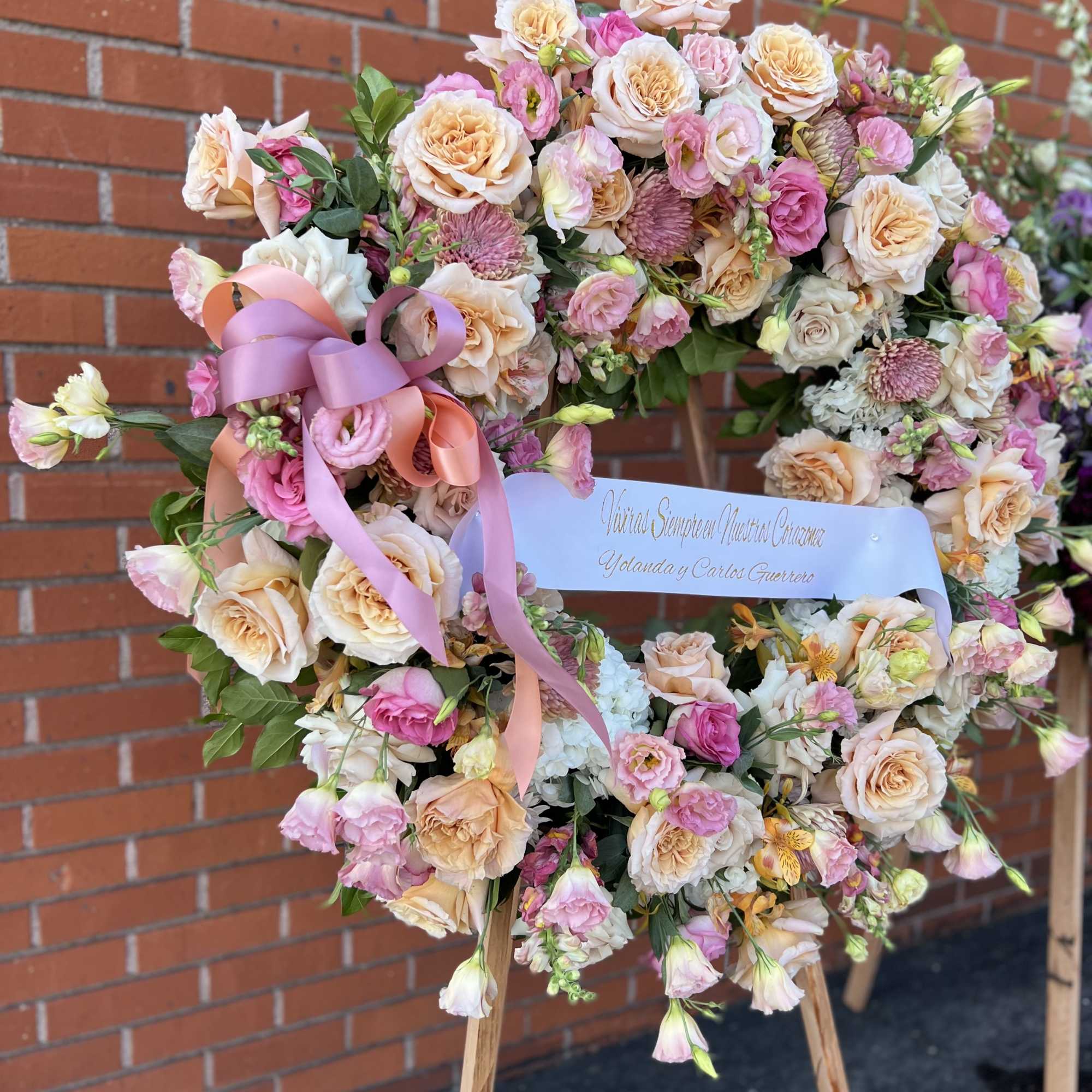 Arrangement with Peach, and a little White Flowers.
36&quot; Approx.