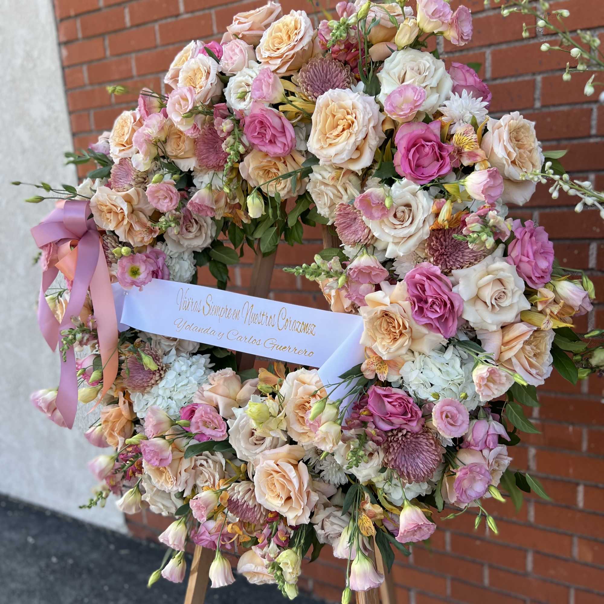 Arrangement with Peach, and a little White Flowers.
36&quot; Approx.