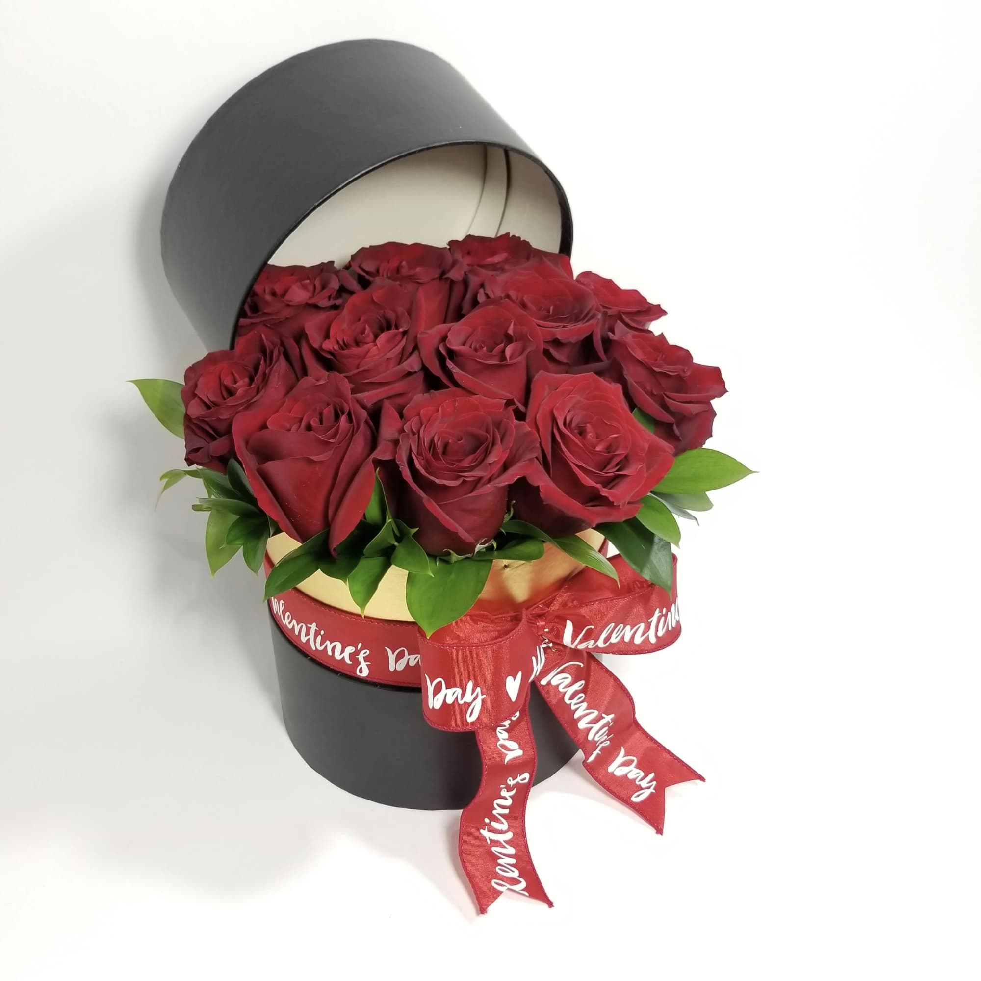 A box of 8, 12, or 24 premium red Roses.

(The color and