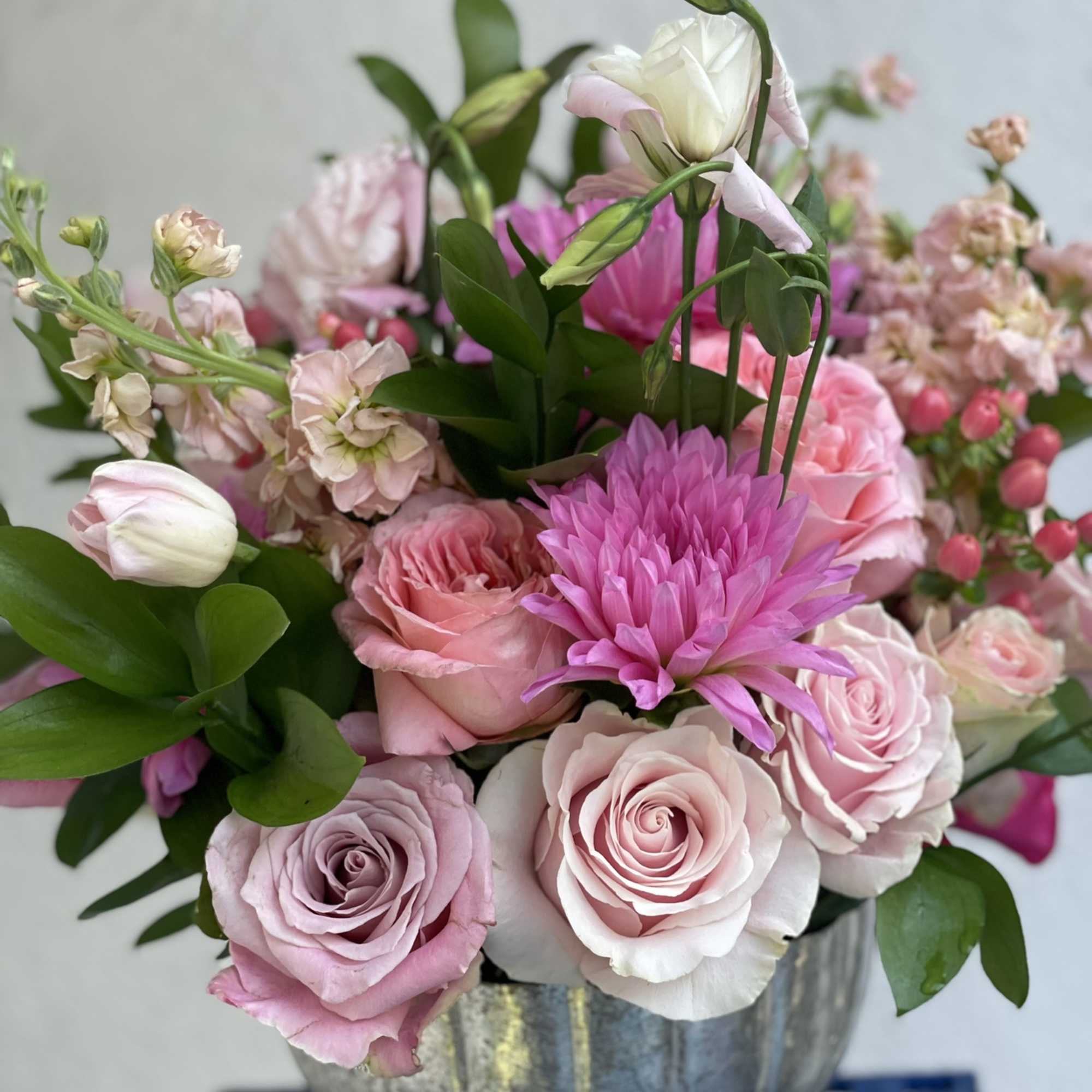 This arrangement is full of color, texture, and depth. The hues of