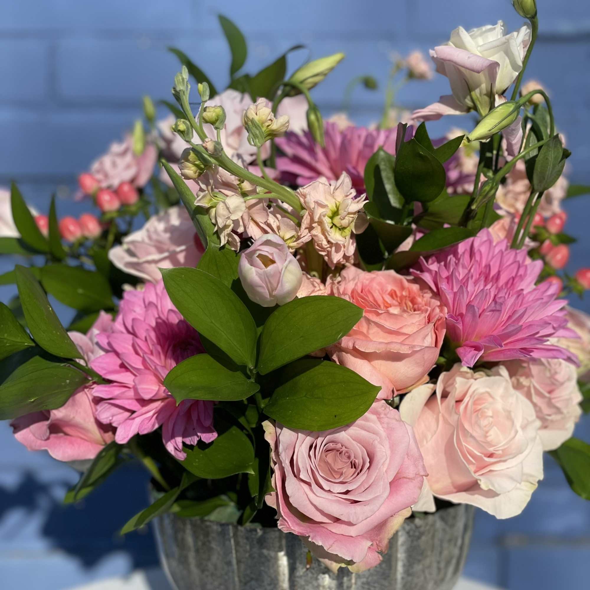 This arrangement is full of color, texture, and depth. The hues of