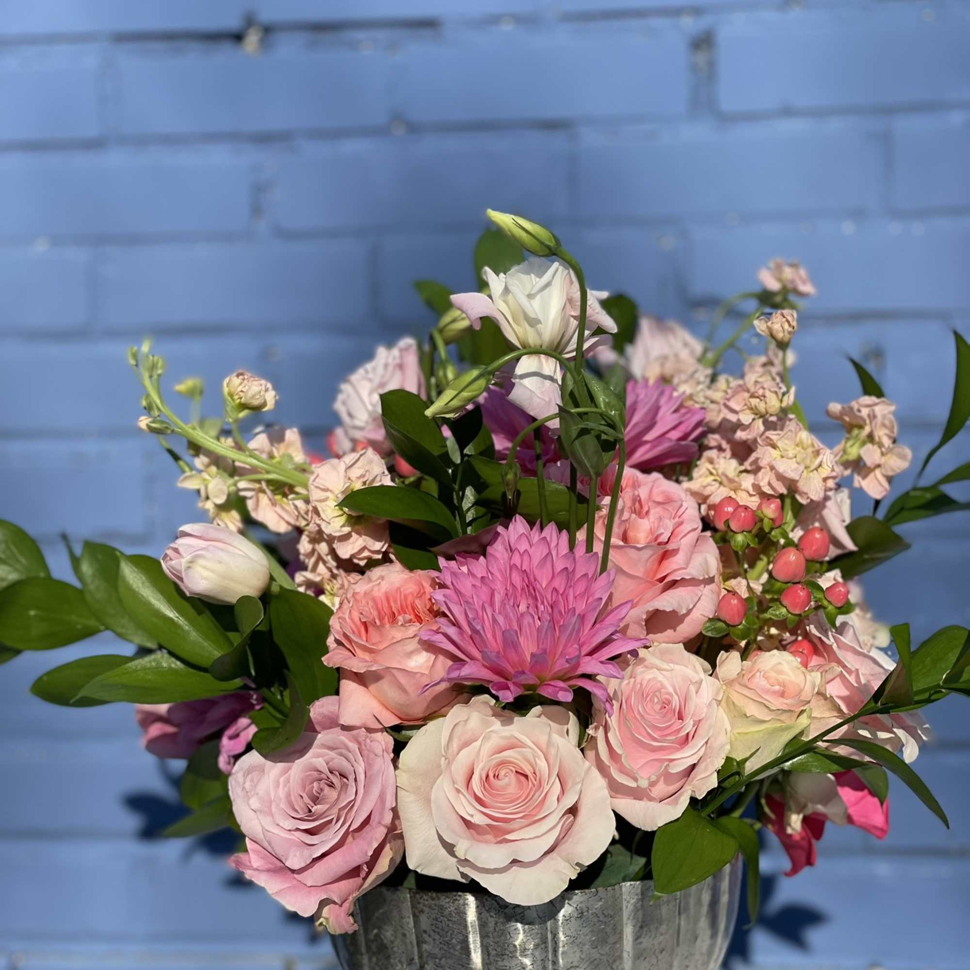 This arrangement is full of color, texture, and depth. The hues of