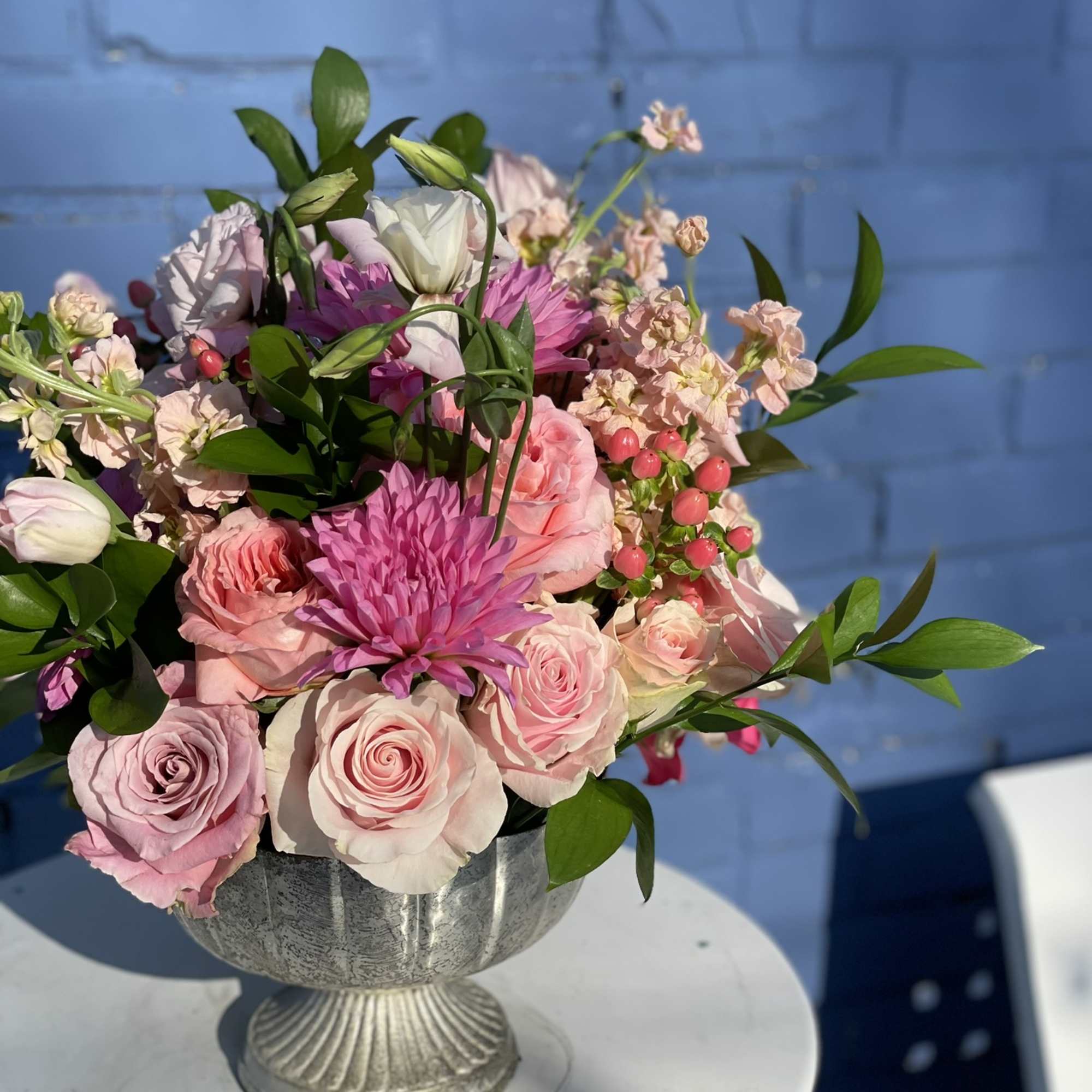 This arrangement is full of color, texture, and depth. The hues of