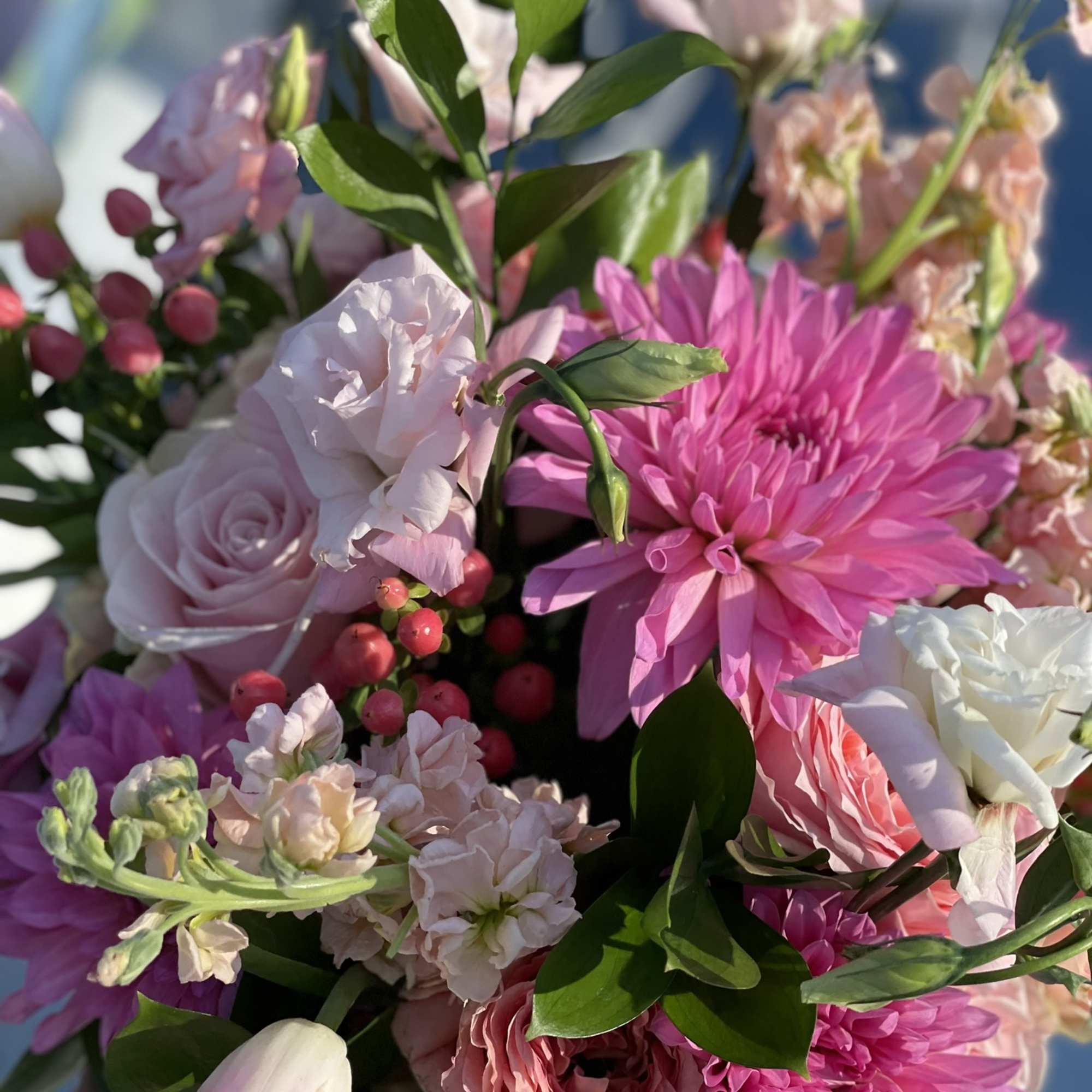 This arrangement is full of color, texture, and depth. The hues of