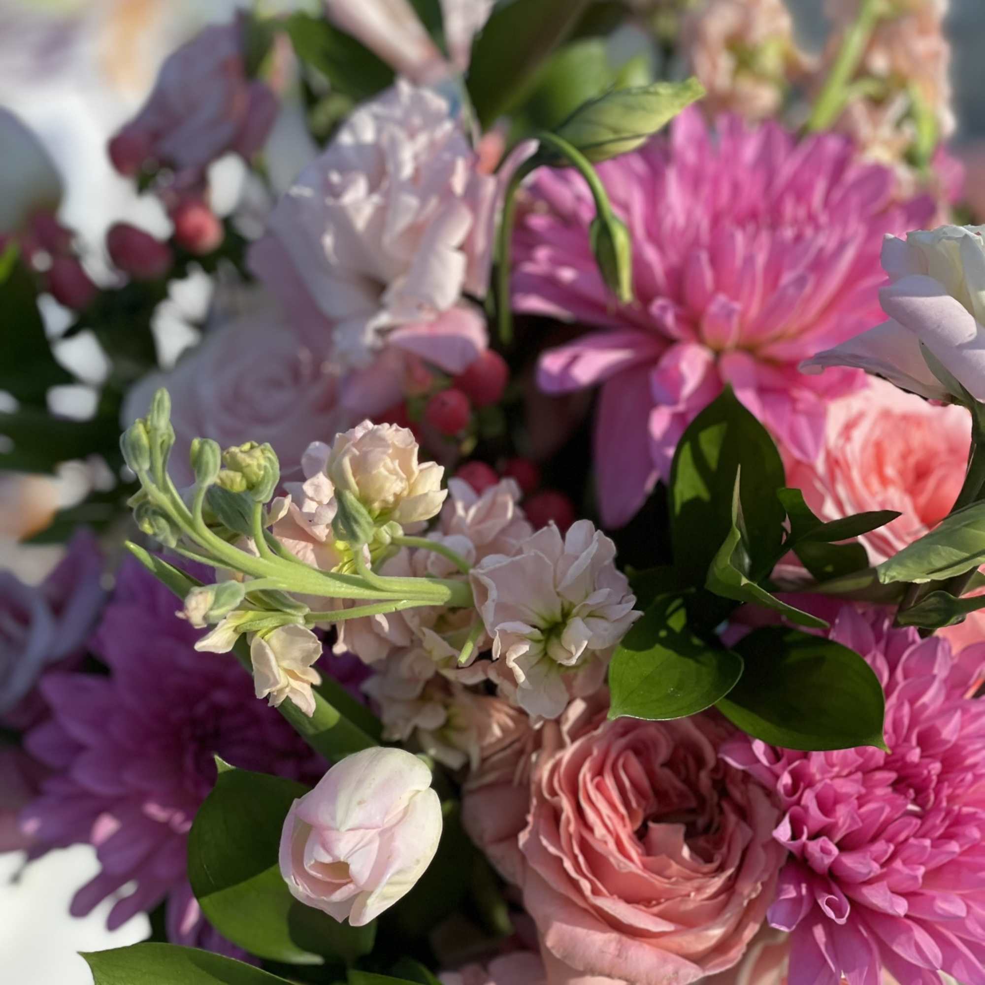 This arrangement is full of color, texture, and depth. The hues of