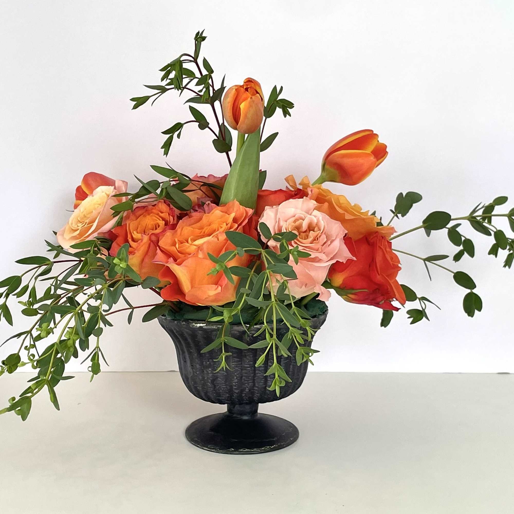 This combination packs a bold punch, radiating deep orange from every bloom