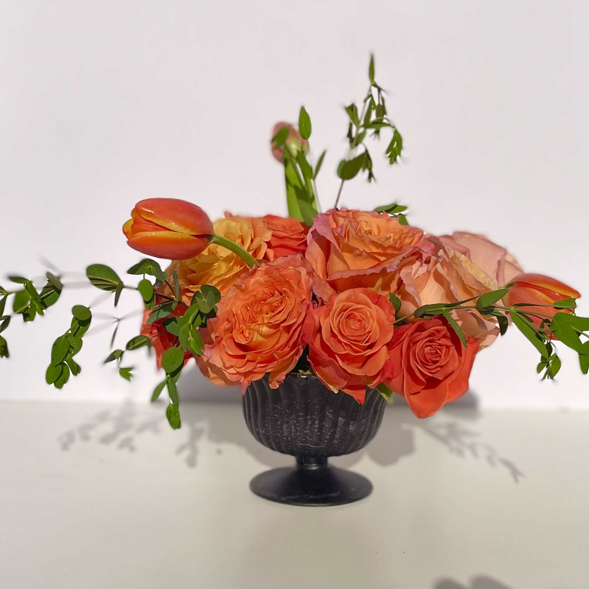 This combination packs a bold punch, radiating deep orange from every bloom