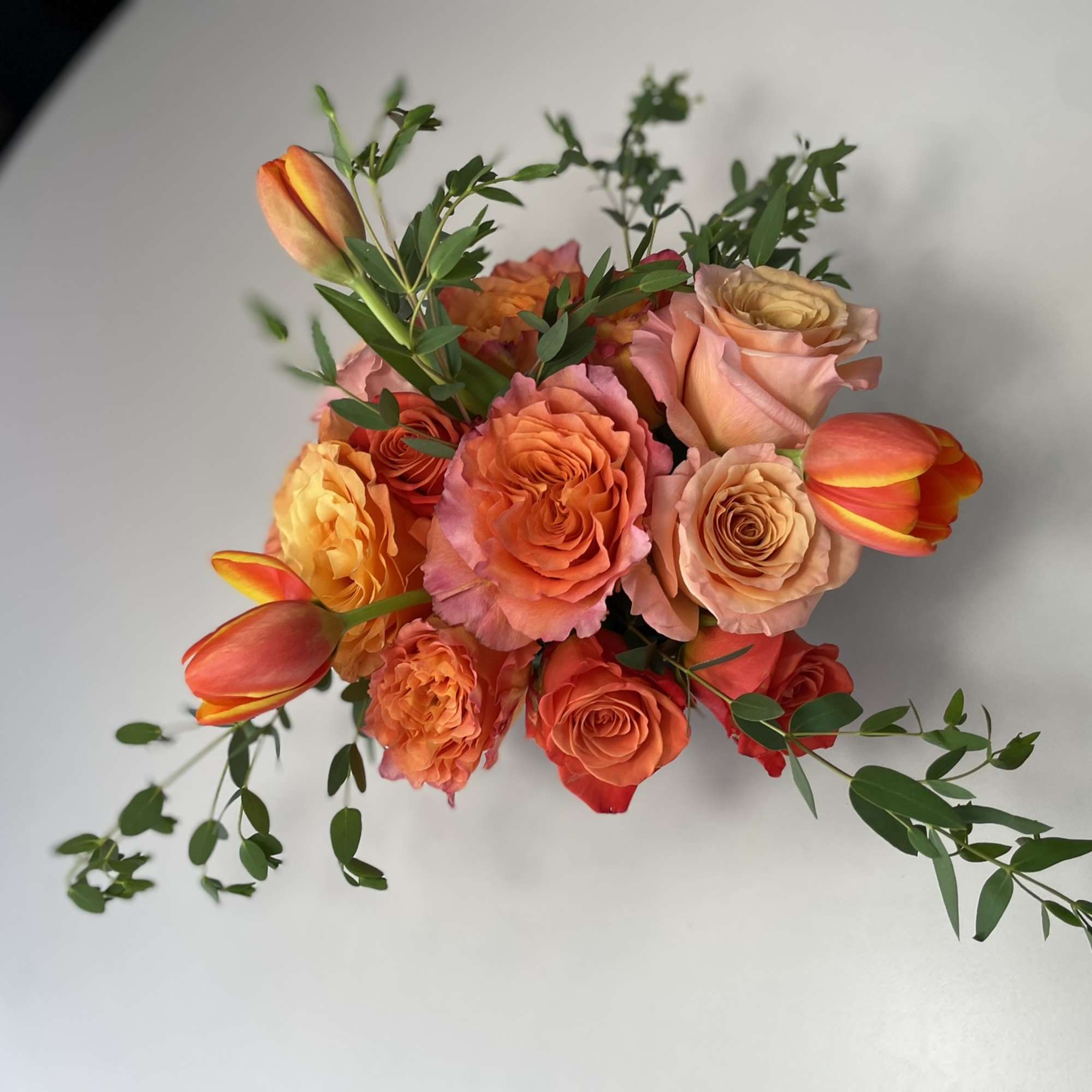 This combination packs a bold punch, radiating deep orange from every bloom