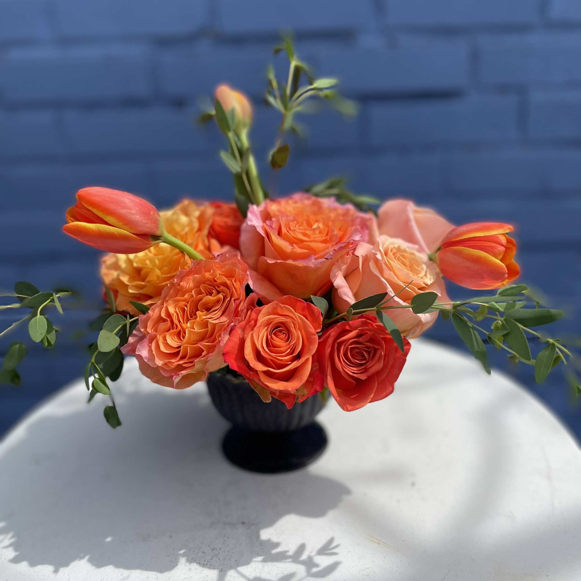 This combination packs a bold punch, radiating deep orange from every bloom