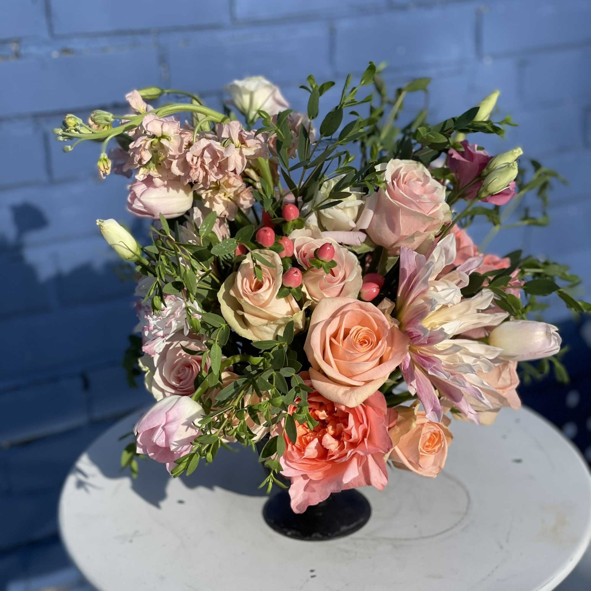 This fun and wild combination of blooms radiate in every tone of