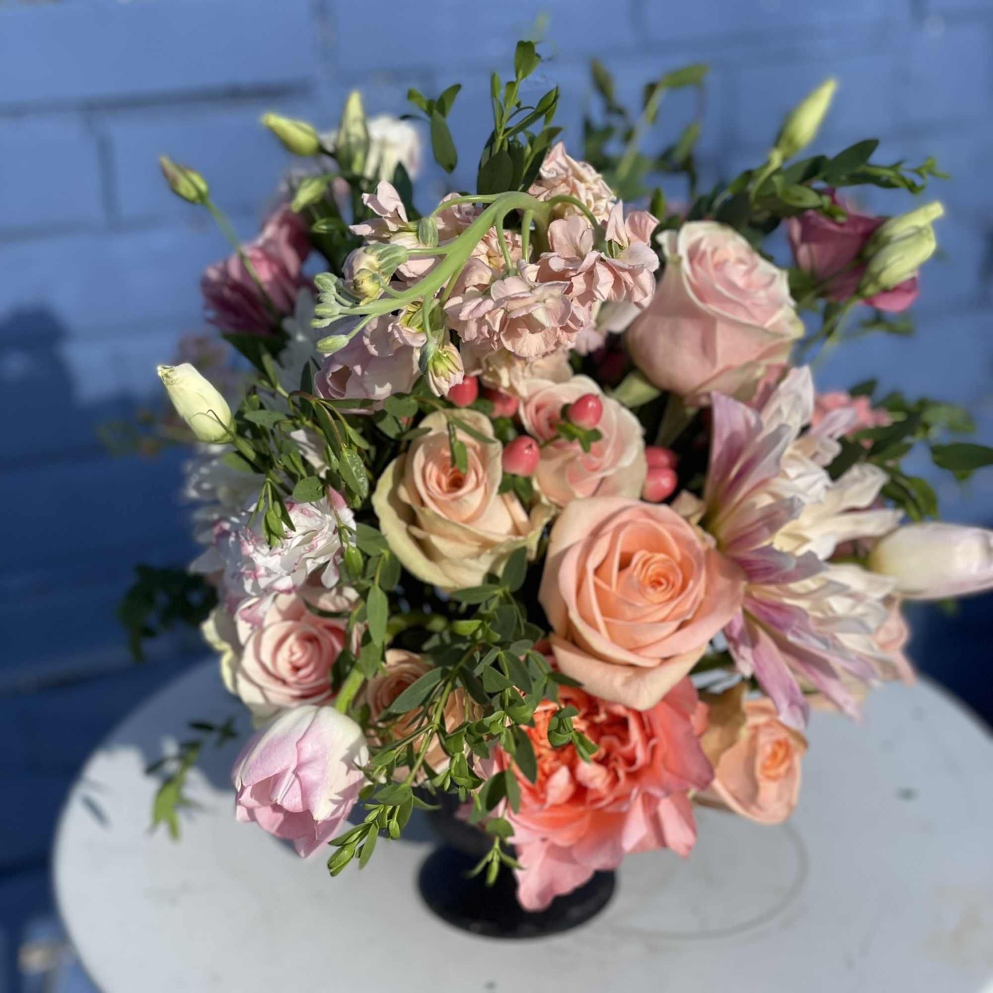 This fun and wild combination of blooms radiate in every tone of