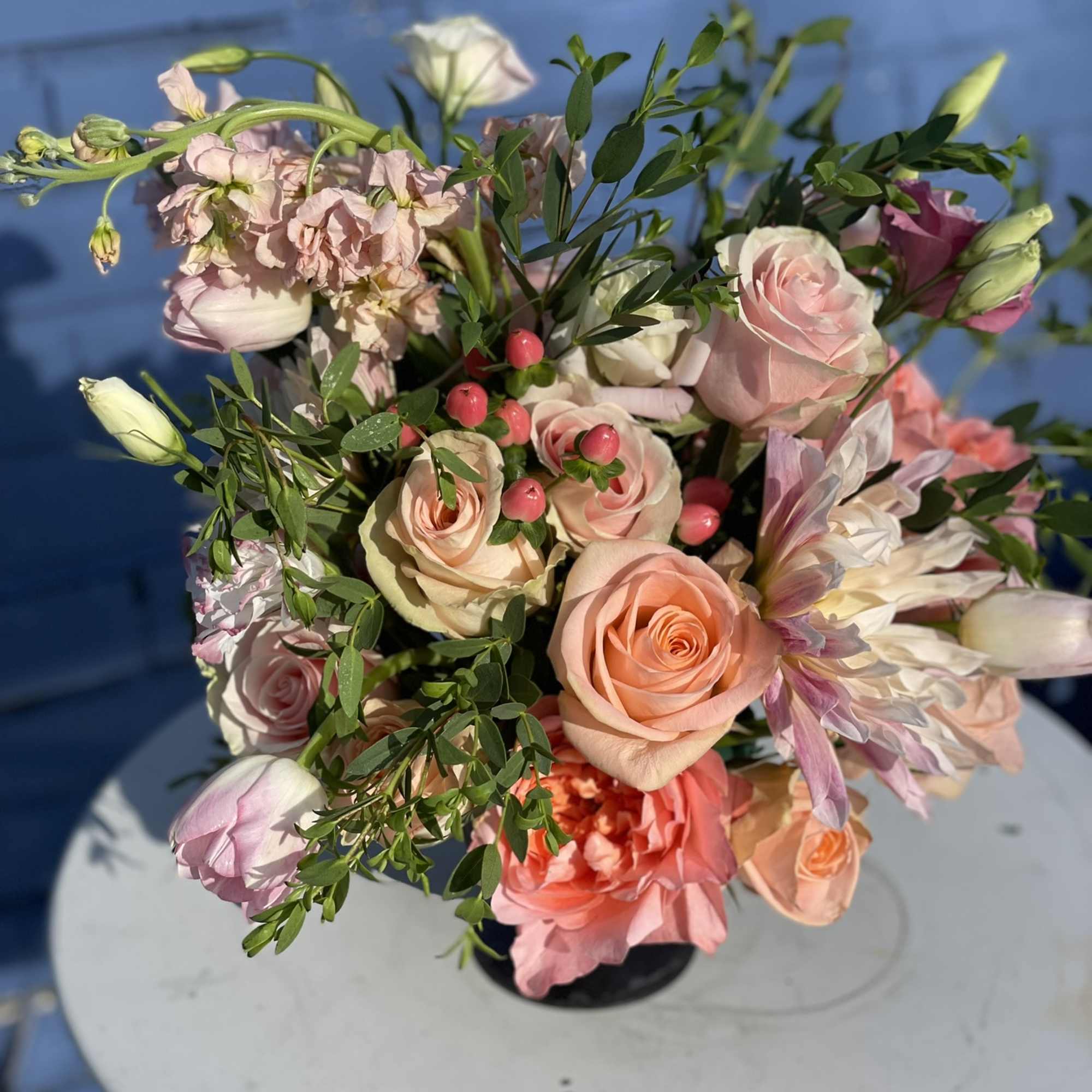 This fun and wild combination of blooms radiate in every tone of