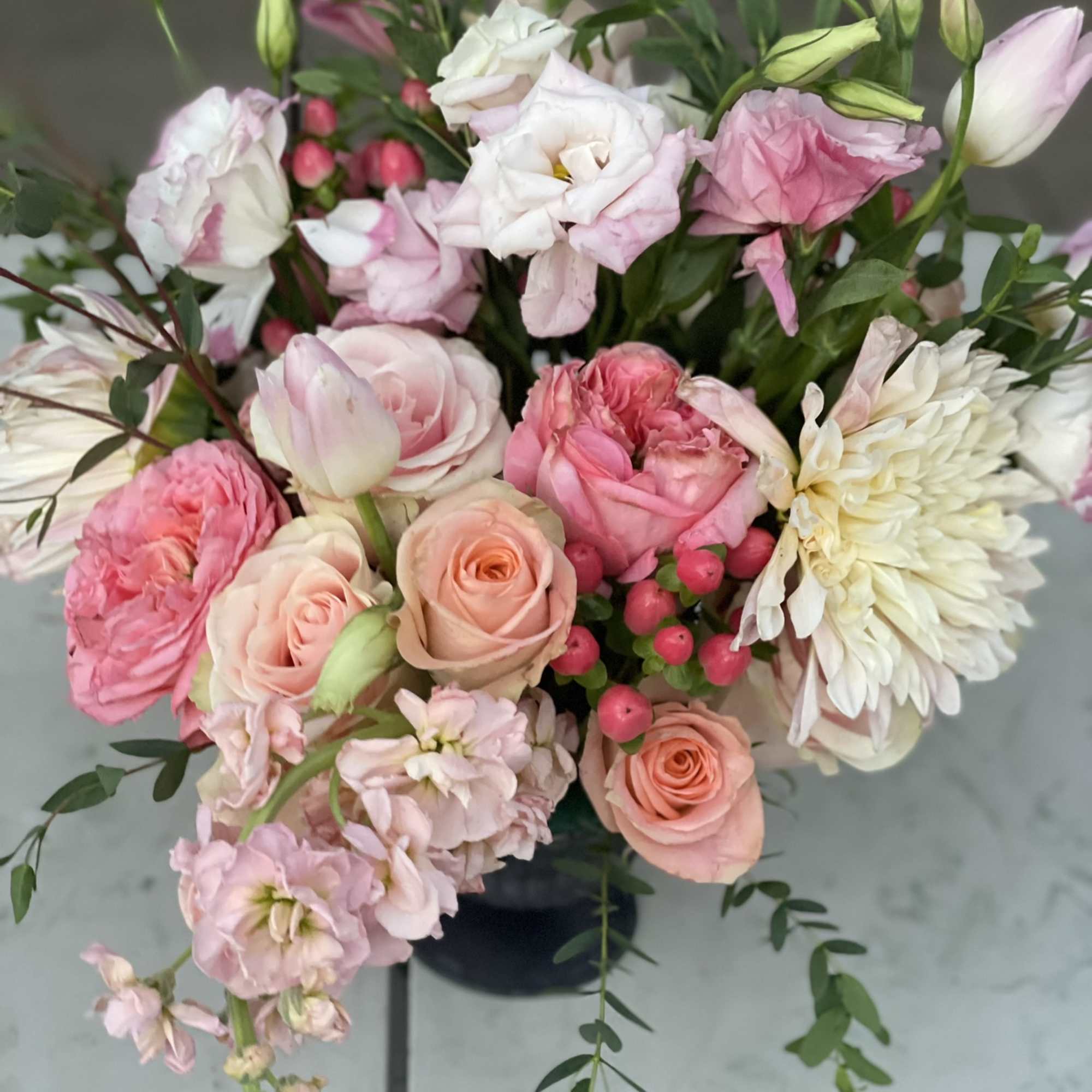 This fun and wild combination of blooms radiate in every tone of