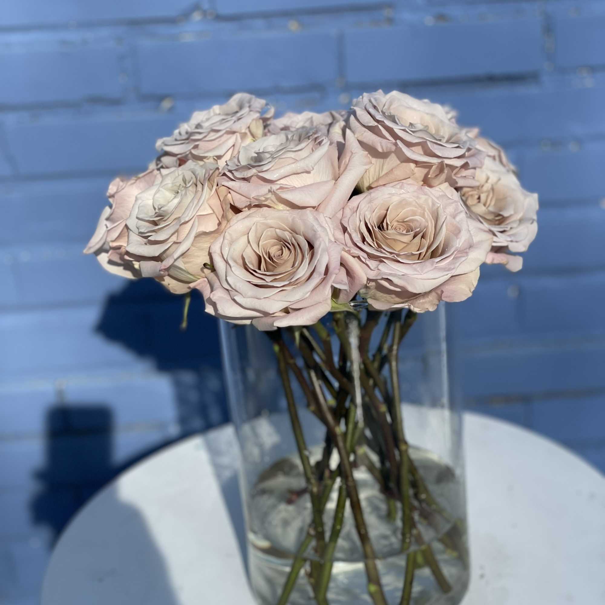 13 Gorgeous and unique quicksand roses arranged in an elegant vase