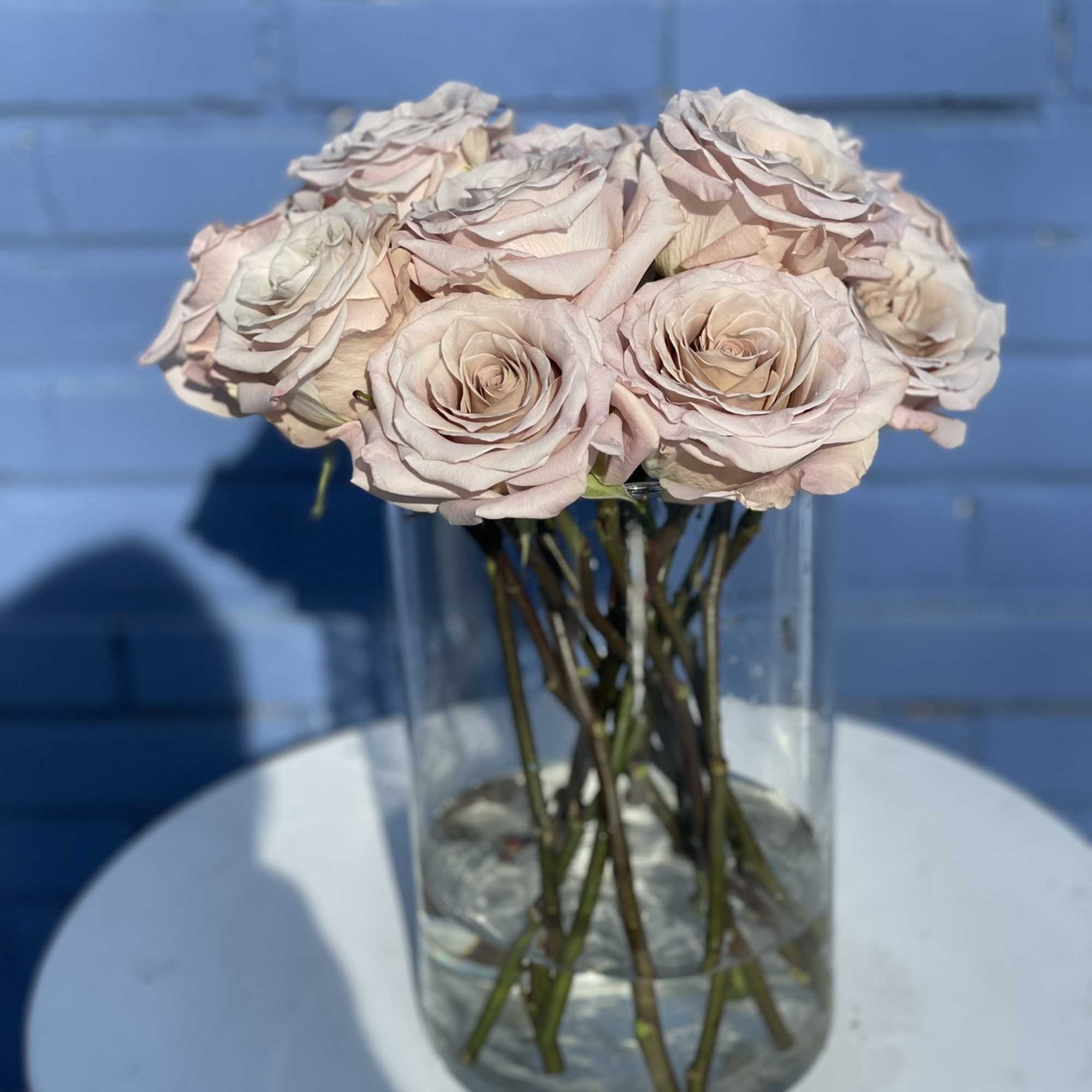 13 Gorgeous and unique quicksand roses arranged in an elegant vase