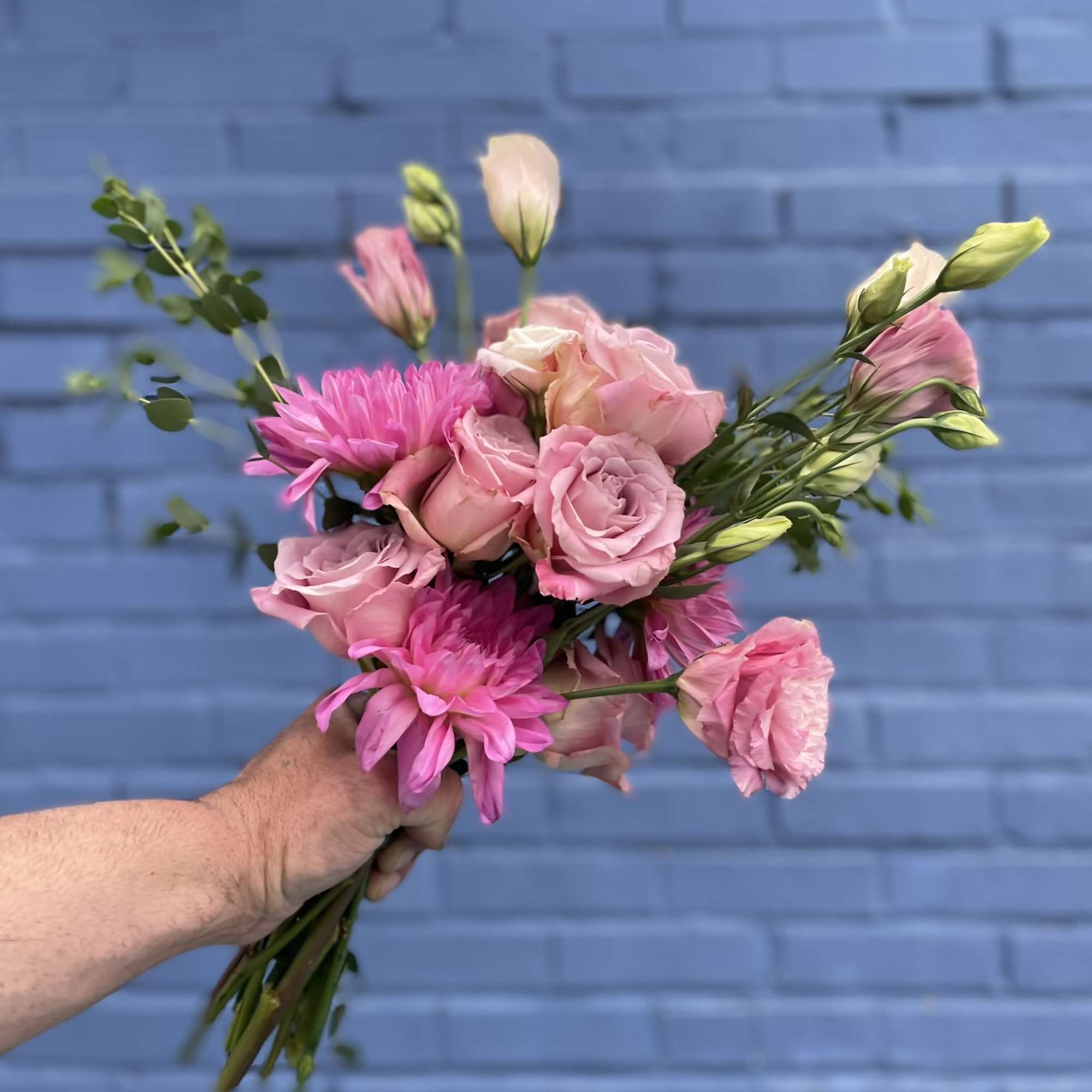 This sweet bouquet in tones of lavender and pink is delightful in