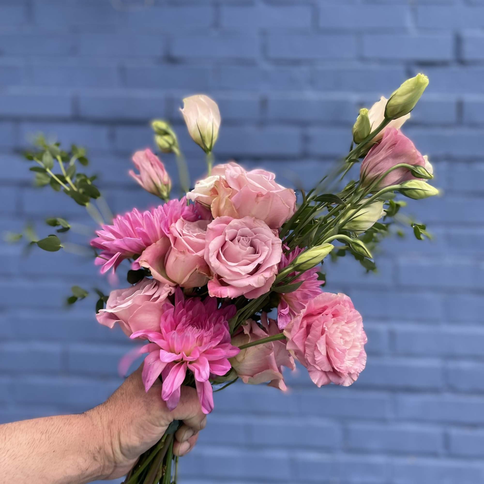 This sweet bouquet in tones of lavender and pink is delightful in