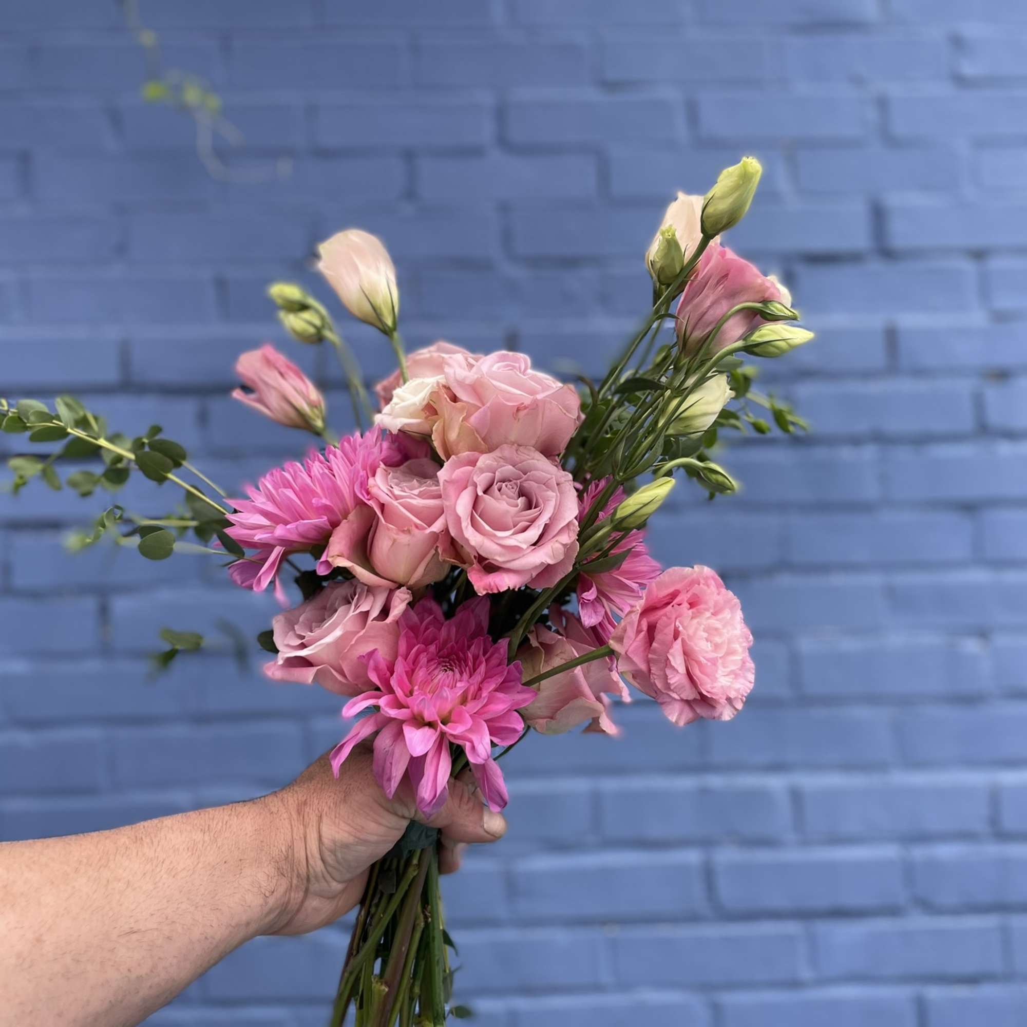 This sweet bouquet in tones of lavender and pink is delightful in