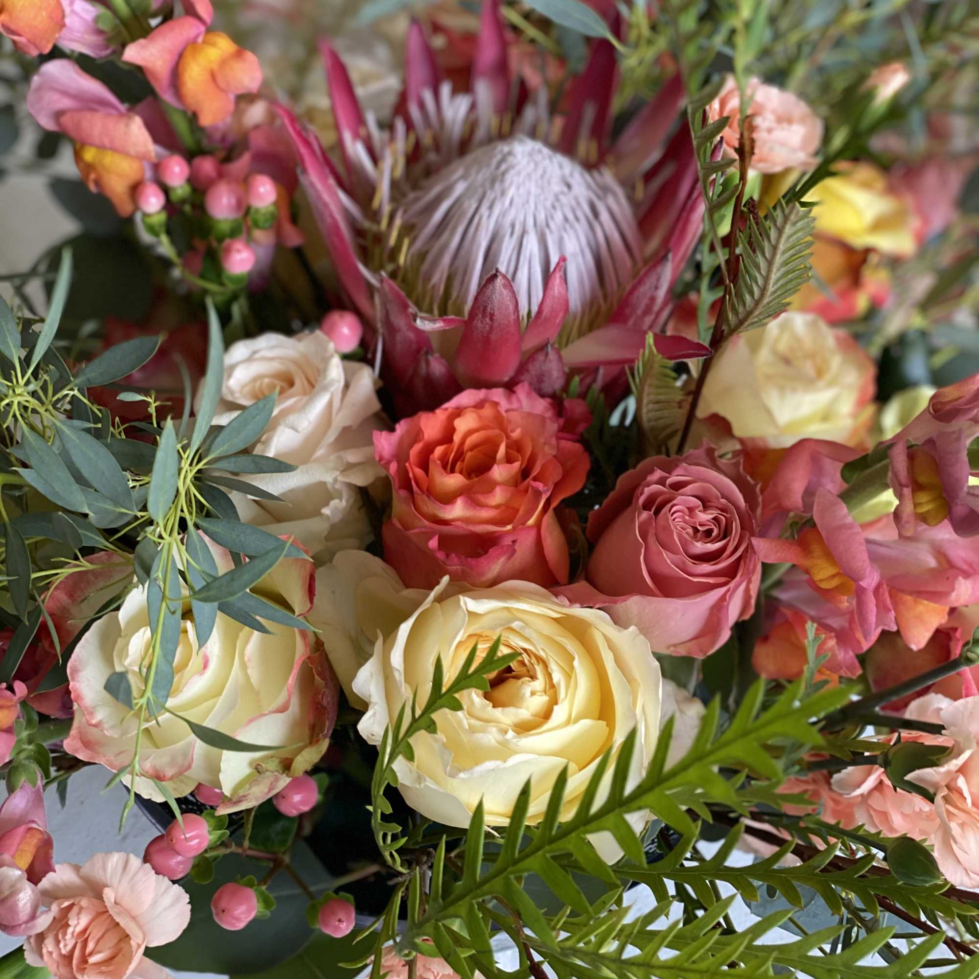 This stunning arrangement boasts all the colors and tones of the Italian