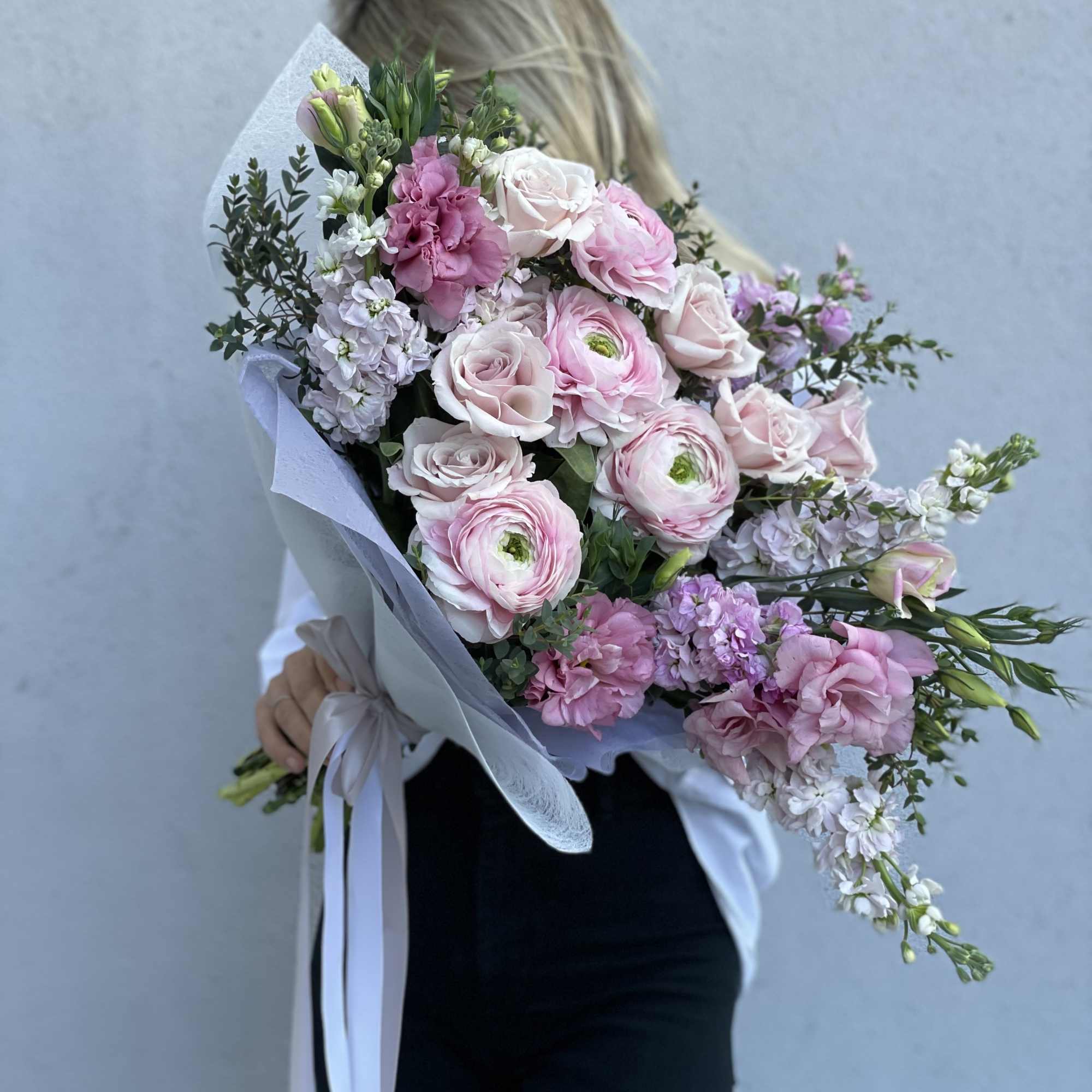 The most delicate ranunculus and roses with airy lisianthus, a very delicate