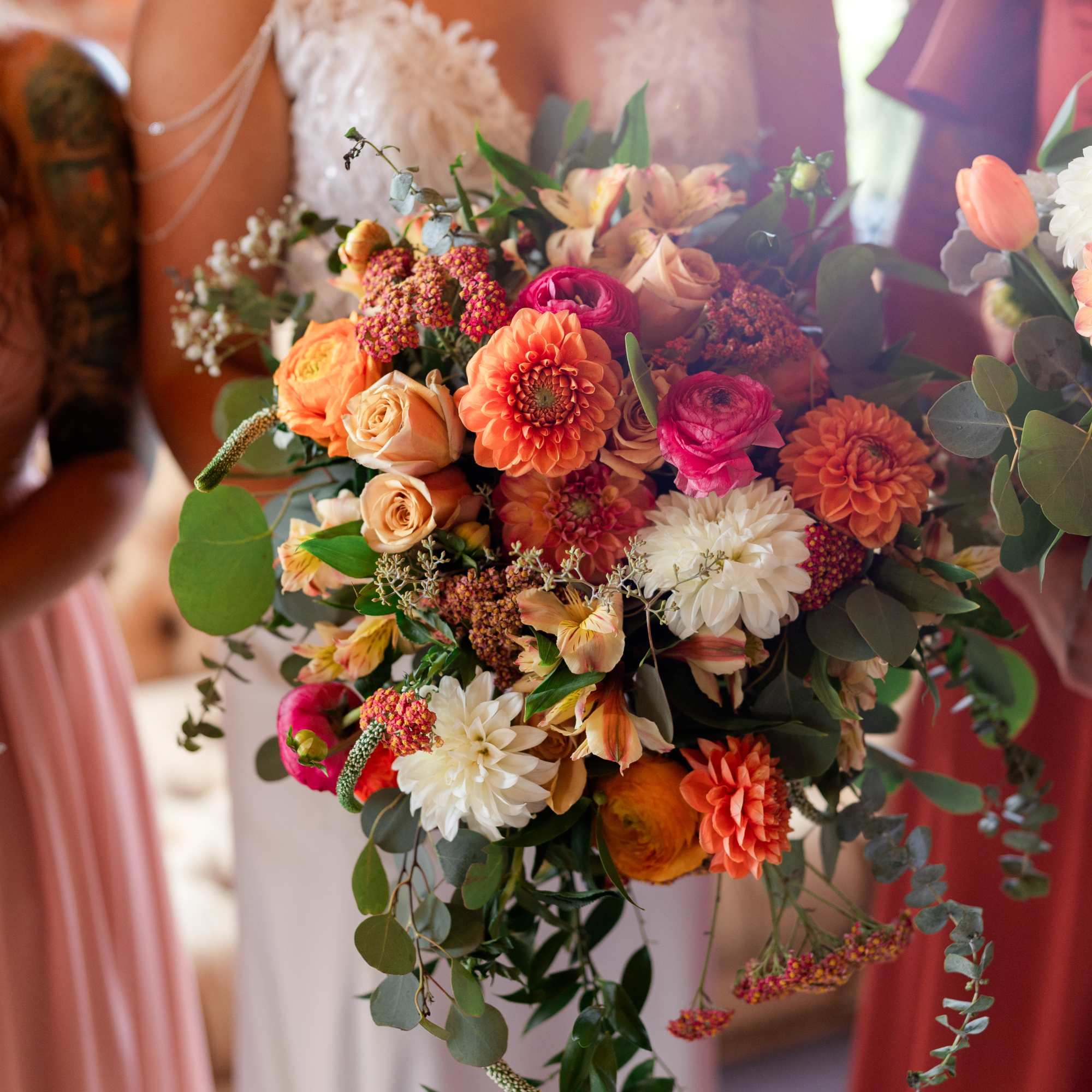 Beautiful fall colors mixed Vintage/ boho cascade with Dahlias, ranunculus's, roses and