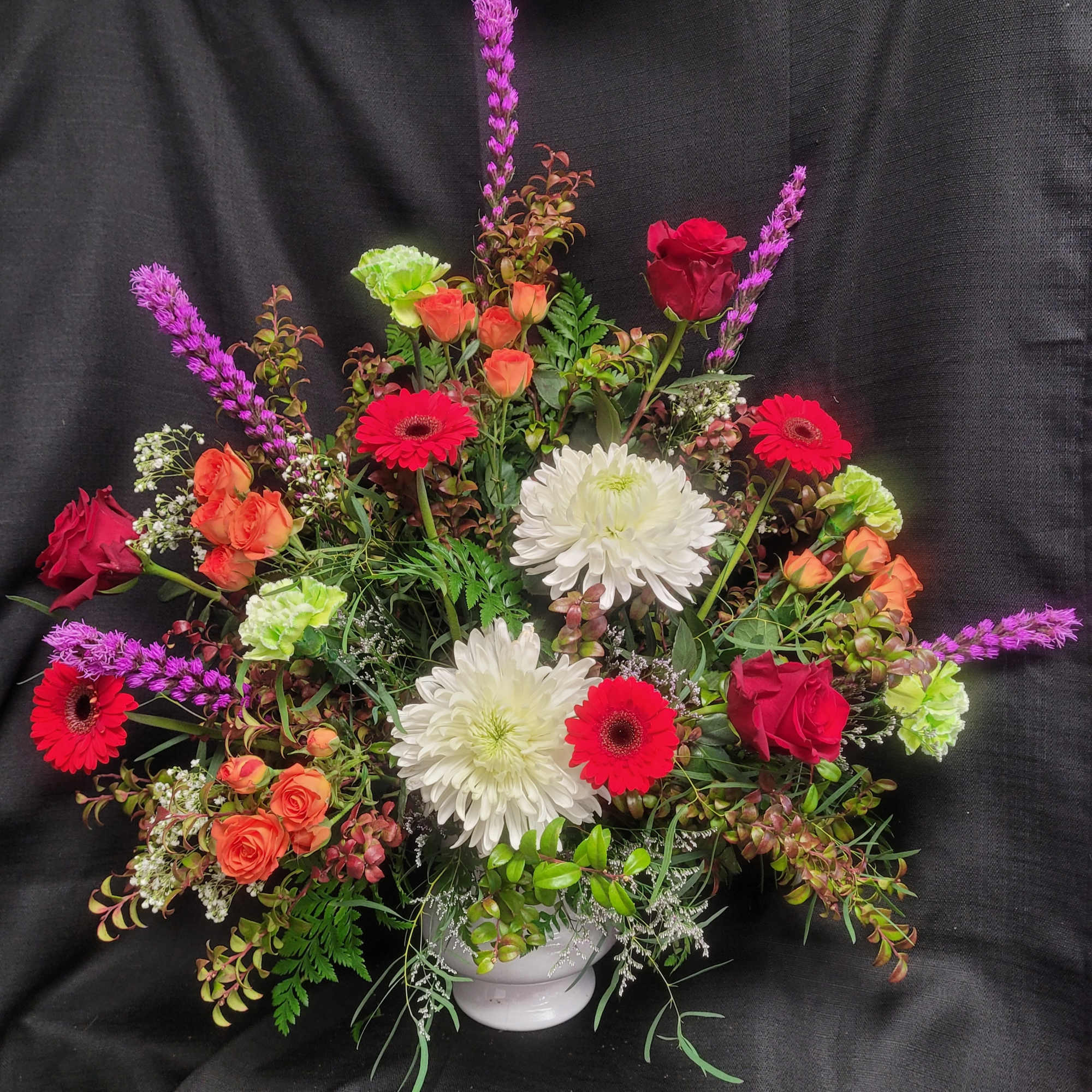 We hope these blooms of liatris, carnations, roses, hydrangeas, gerbera daisies, spider