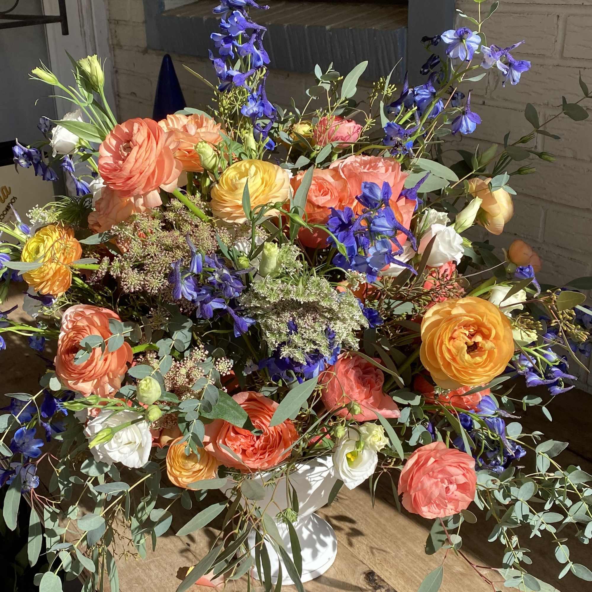 This arrangement is a joy to behold with its peach tones, deep