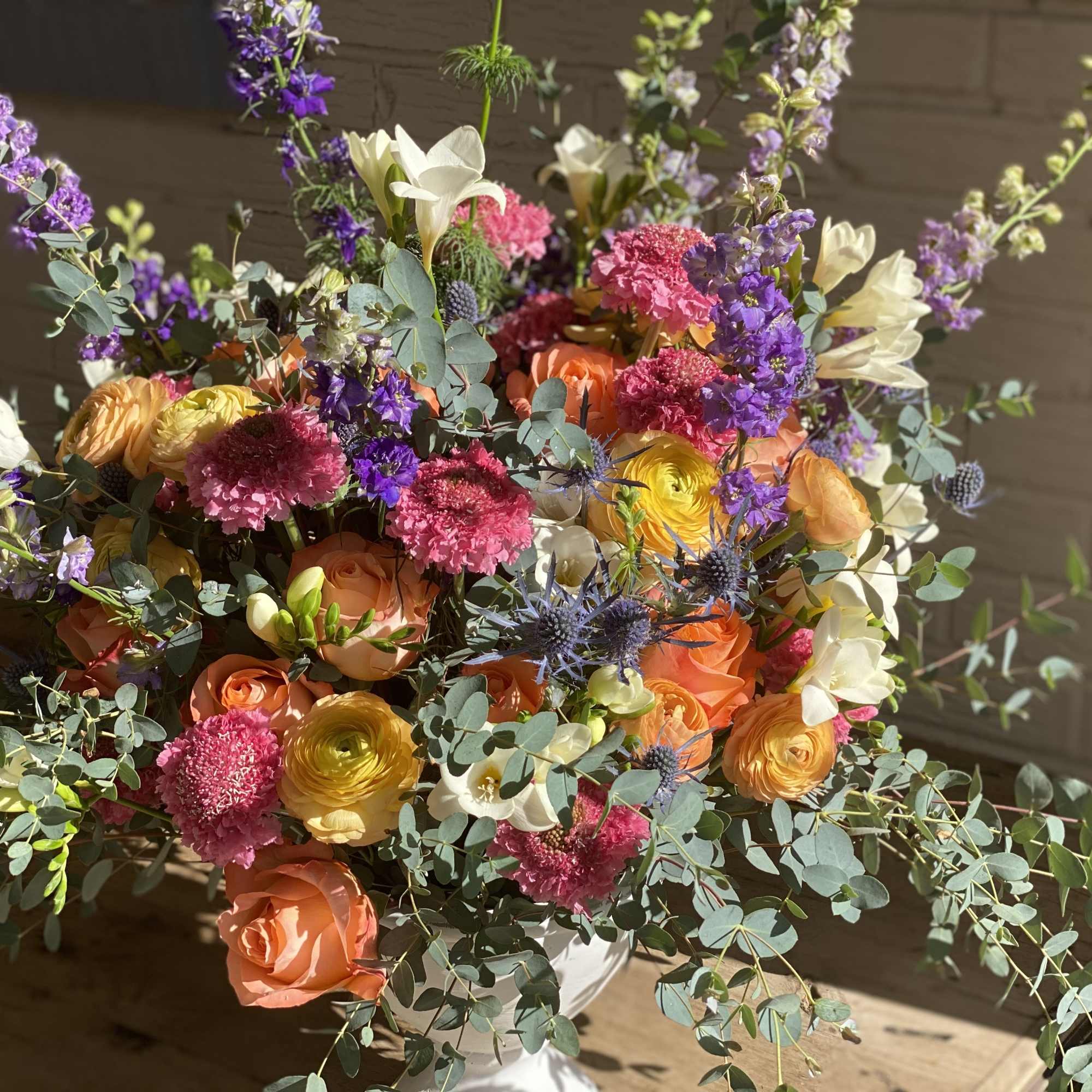 This arrangement is a joy to behold with its peach tones, deep