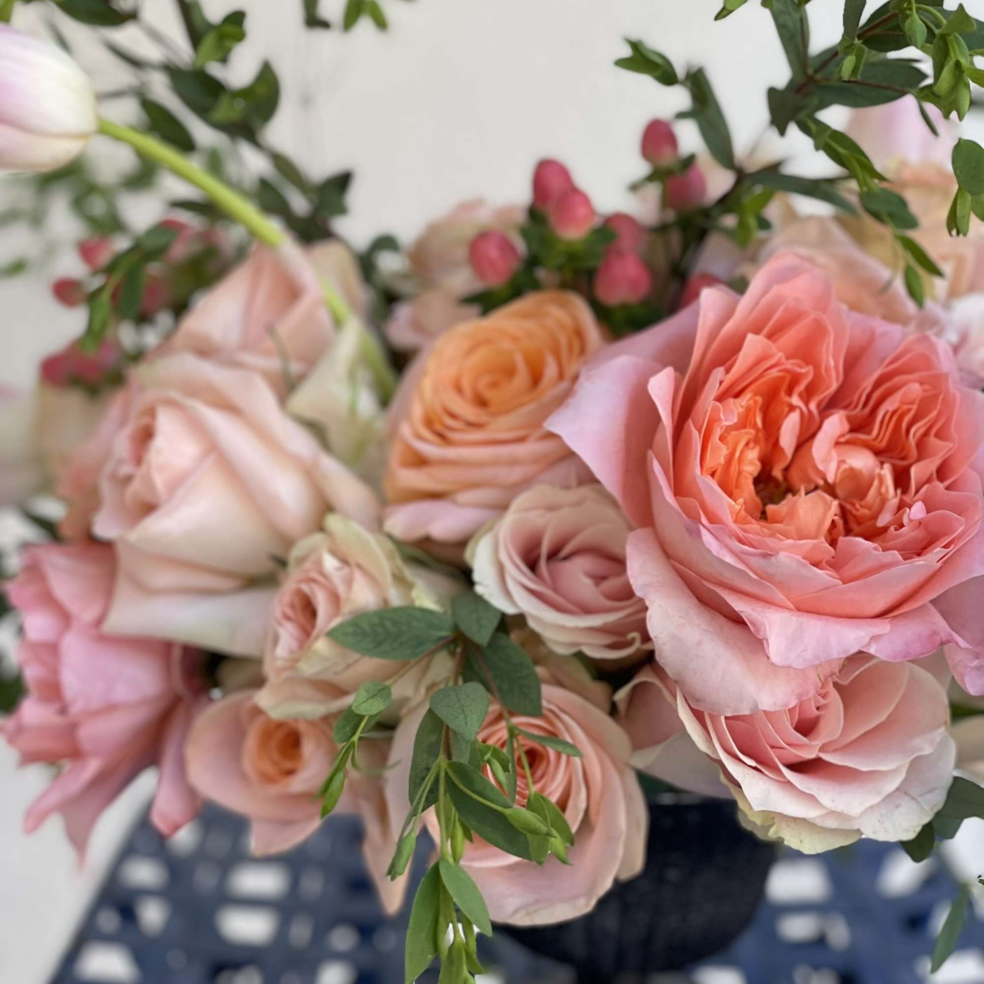 This little arrangement packs a big punch, with its brightly colored roses