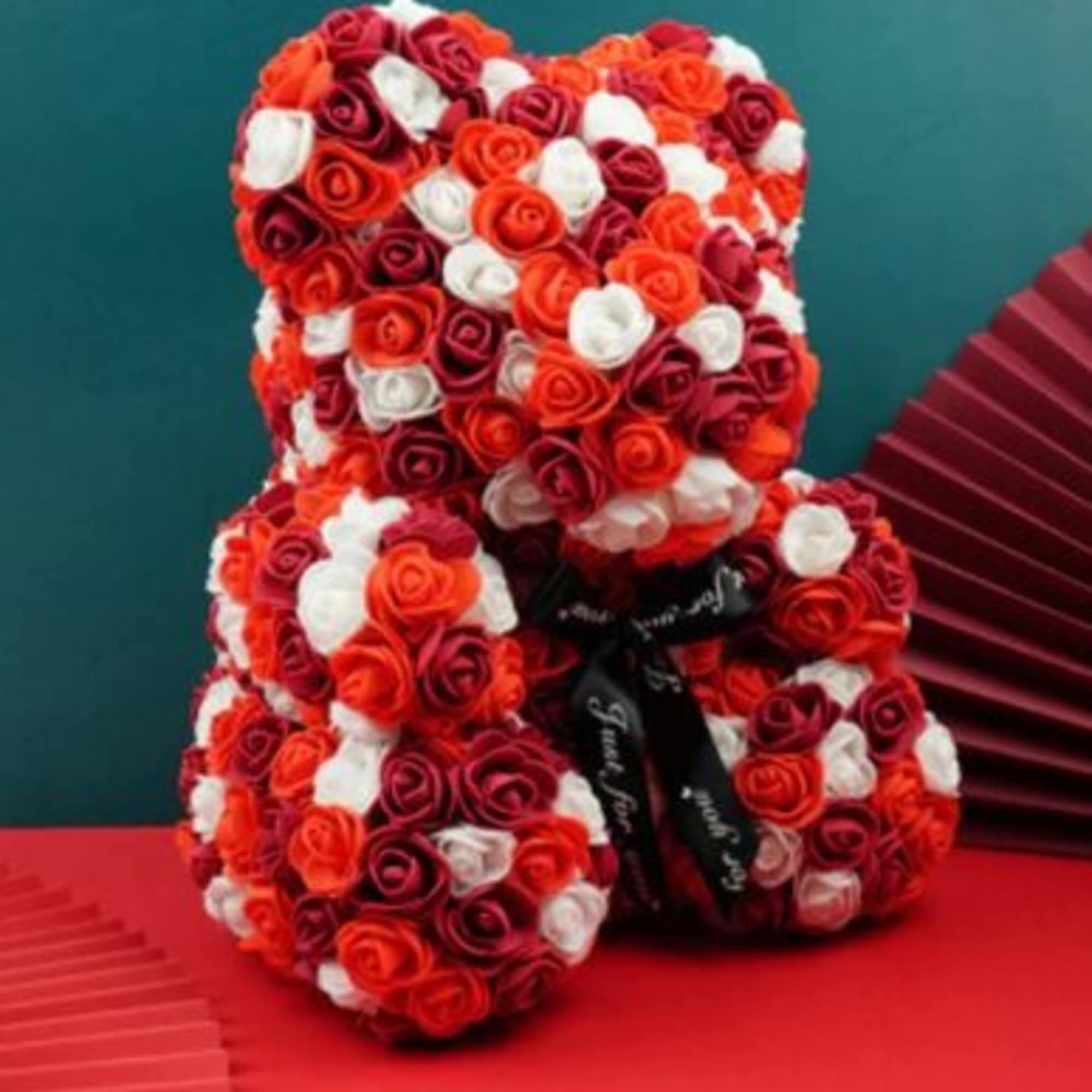 We have this beautiful bears in pink, red, white, black and different