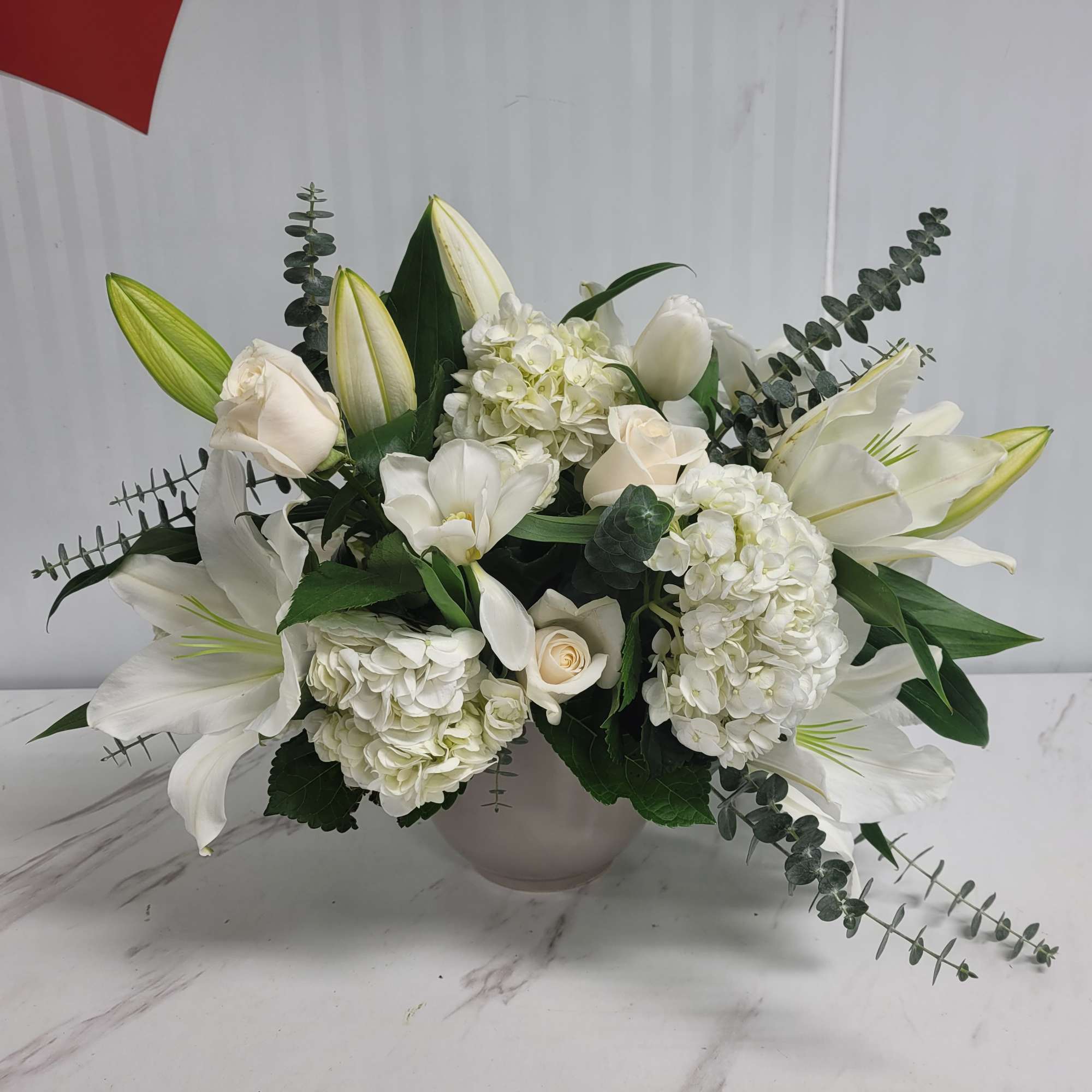 Send something to let them know you care. Featuring blue hydrangea, white