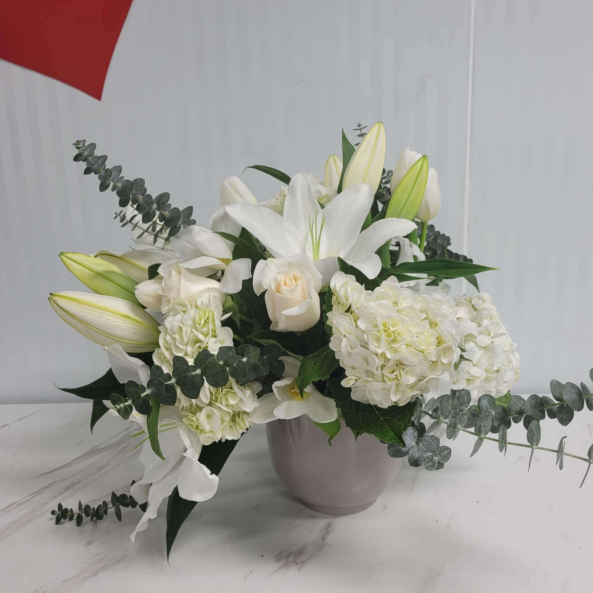 Send something to let them know you care. Featuring blue hydrangea, white