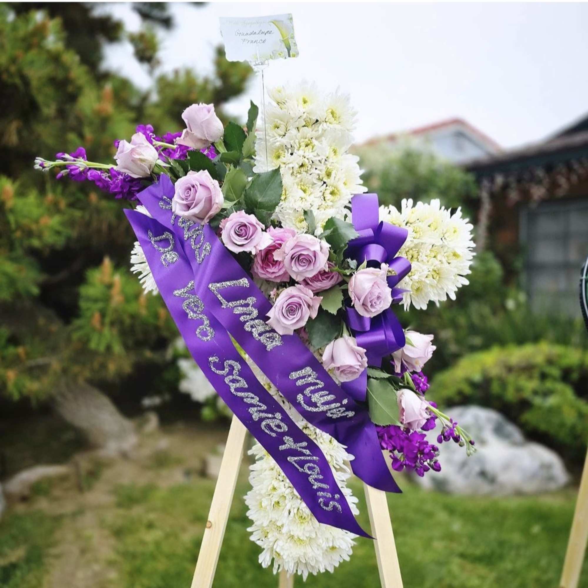 Purple and white standing funeral cross in van nuys, CA | Everlast Floral  Arrangements