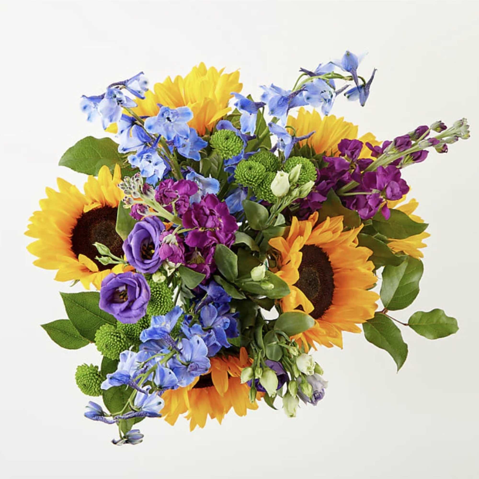 Travel to a warm summer day with the Catching Rays Bouquet, a