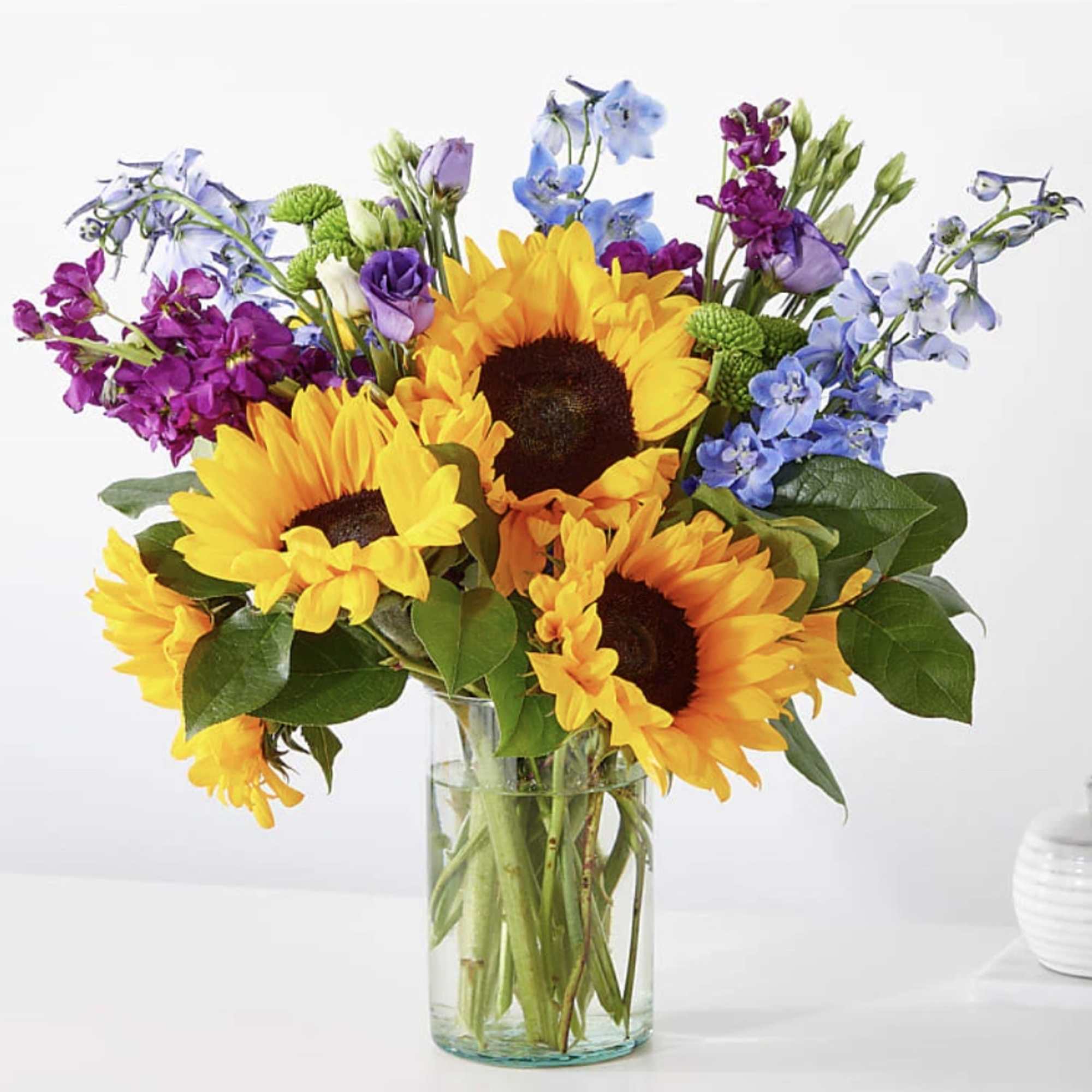 Travel to a warm summer day with the Catching Rays Bouquet, a