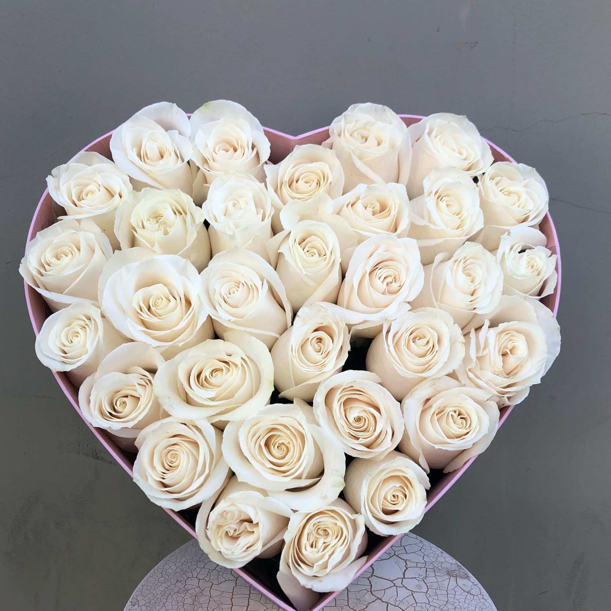 Heart box with fresh white roses. 