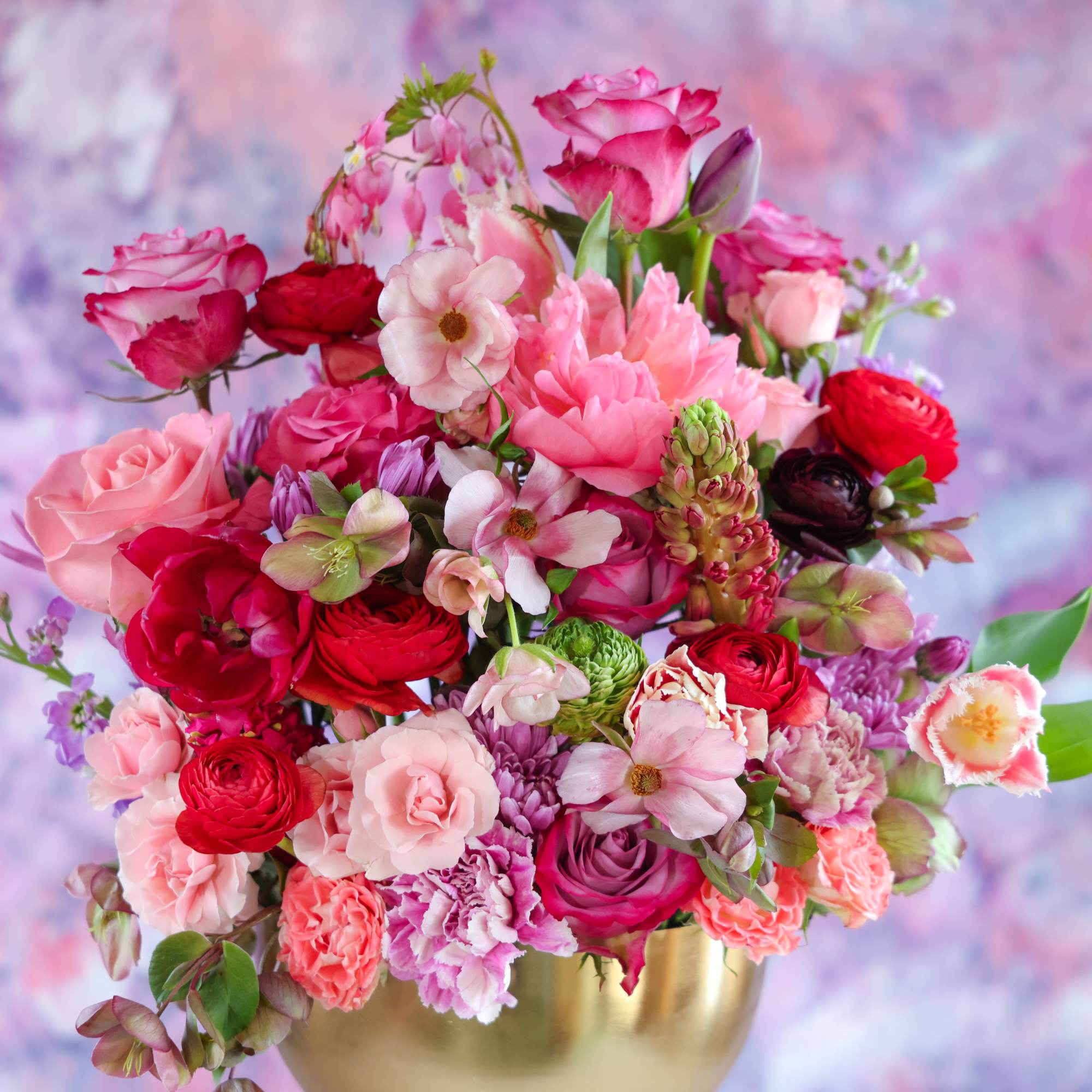 The Hearts and Flowers Arrangement

Lush spring blooms in array of flushed pinks