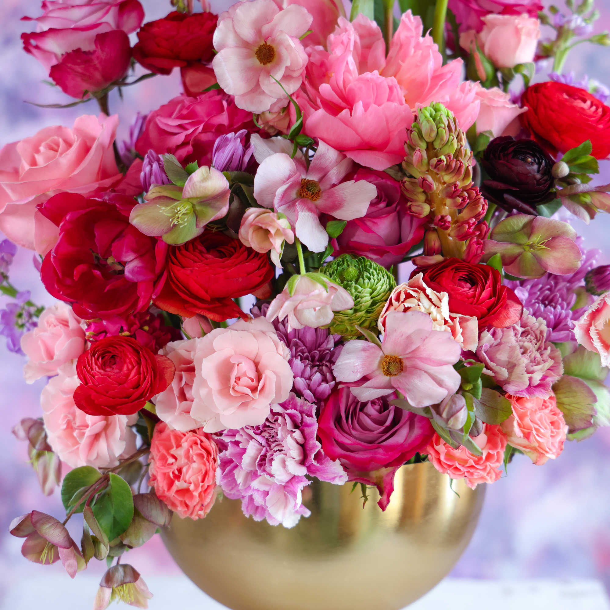 The Hearts and Flowers Arrangement

Lush spring blooms in array of flushed pinks