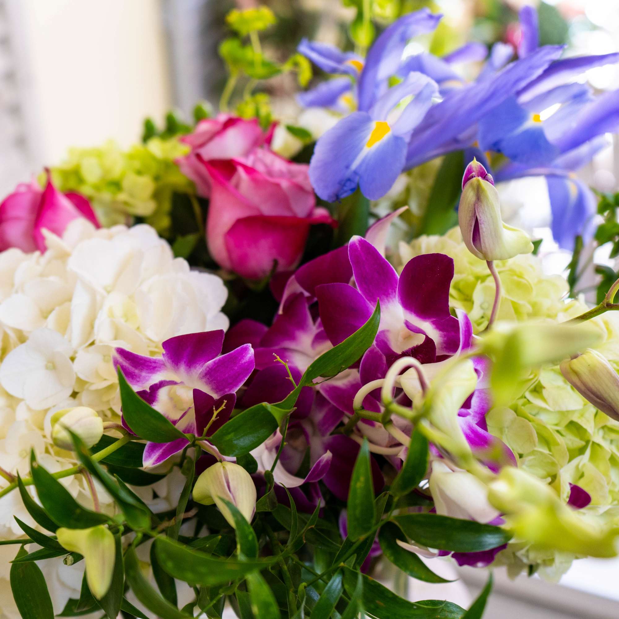 A bright and vibrant arrangement perfect for any celebration needed a pop