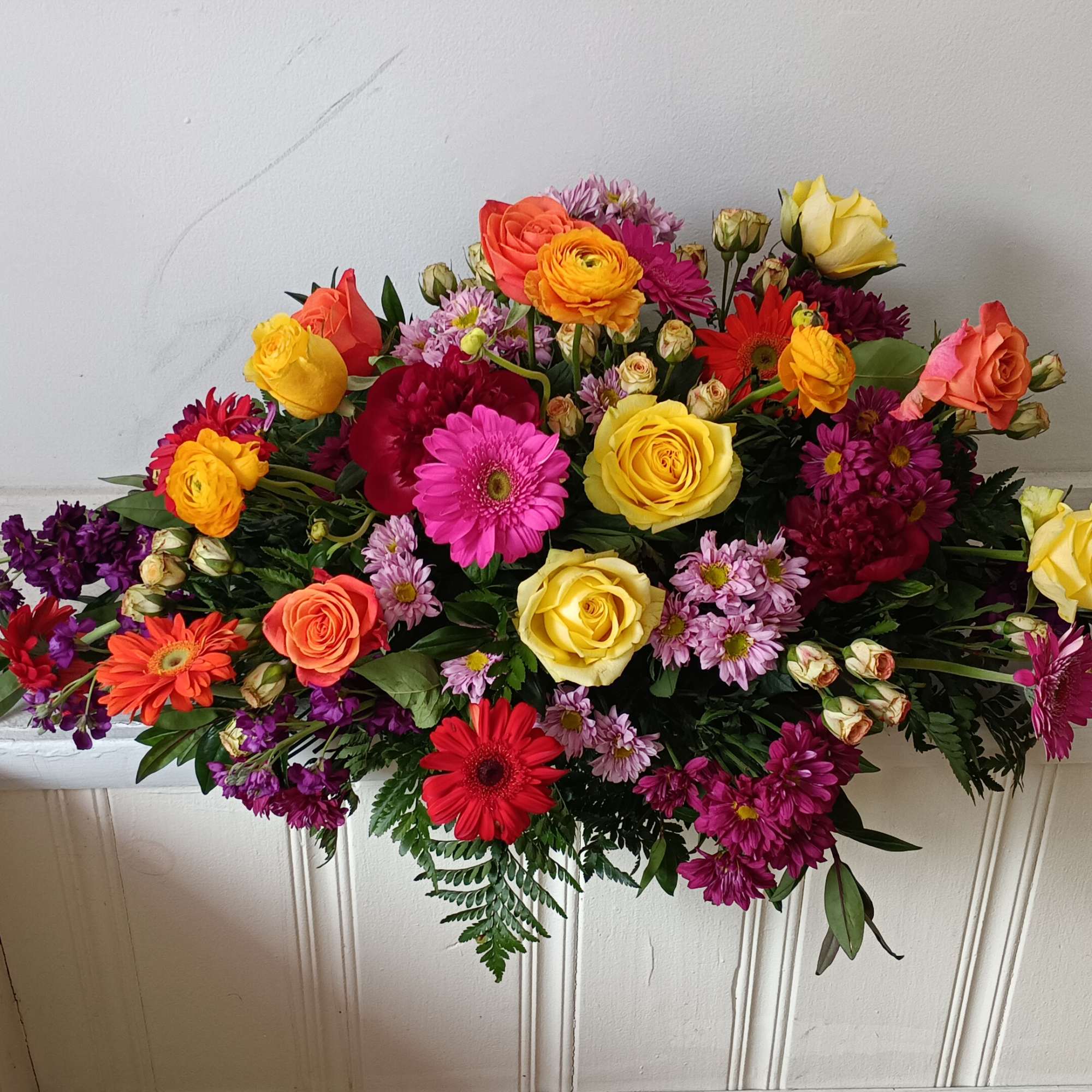 Casket sat: 1) half a casket spray, 2) half a casket spray