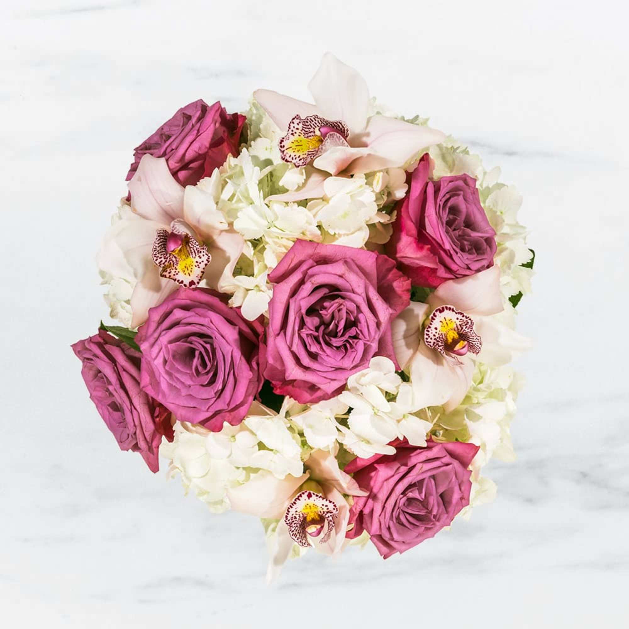 Our most popular arrangement! Pop of Lavender is the perfect gift to