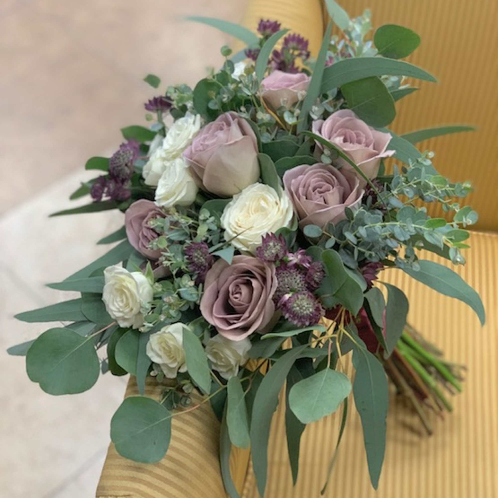 The &ldquo;Palm&rdquo; bridal bouquet fits an array of color palettes with its