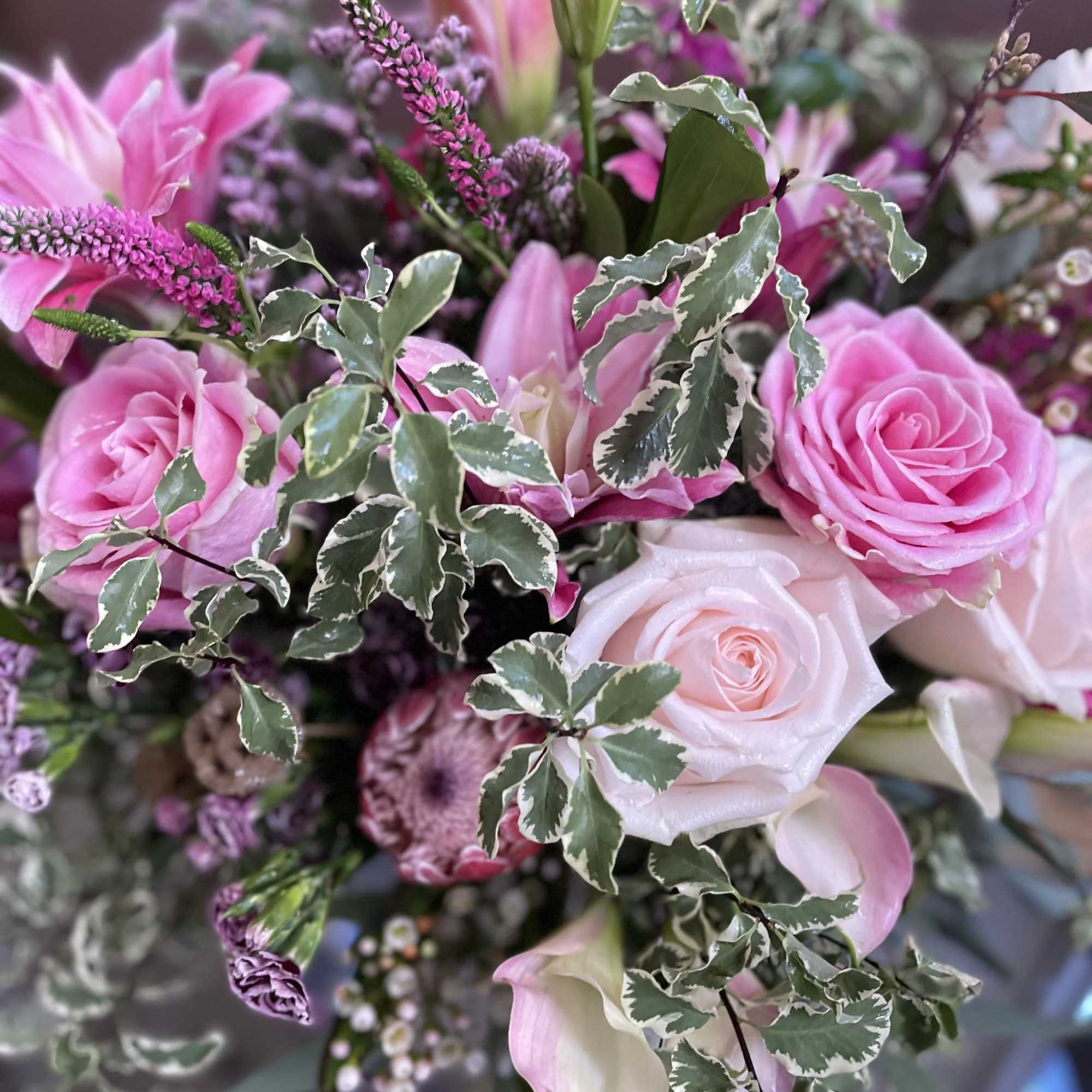 Marvelous composition with lilies , roses and delicate flowers. Peaceful and elegant.