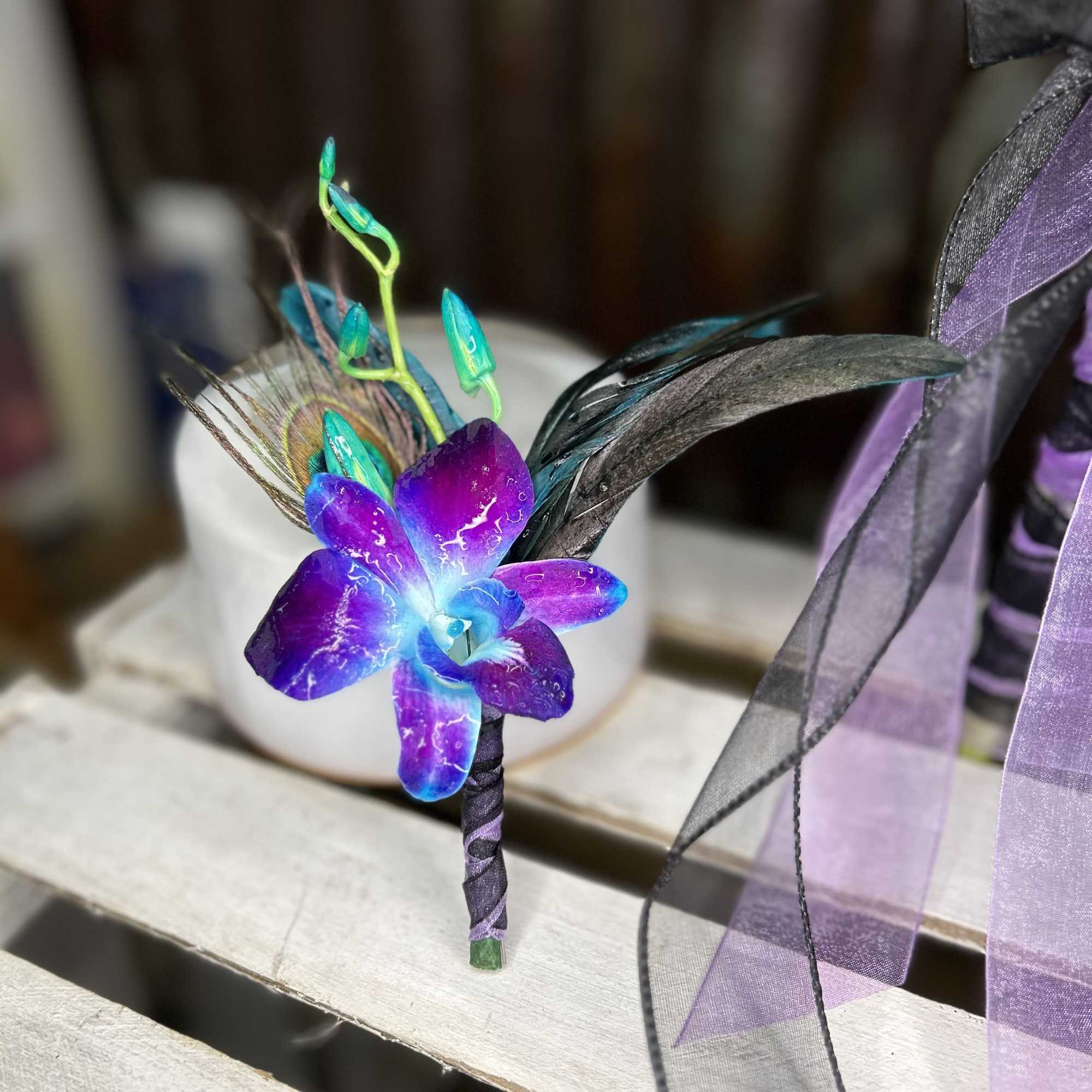 All boutonnieres are custom made to order. PLEASE WHEN ORDERING PUT IN