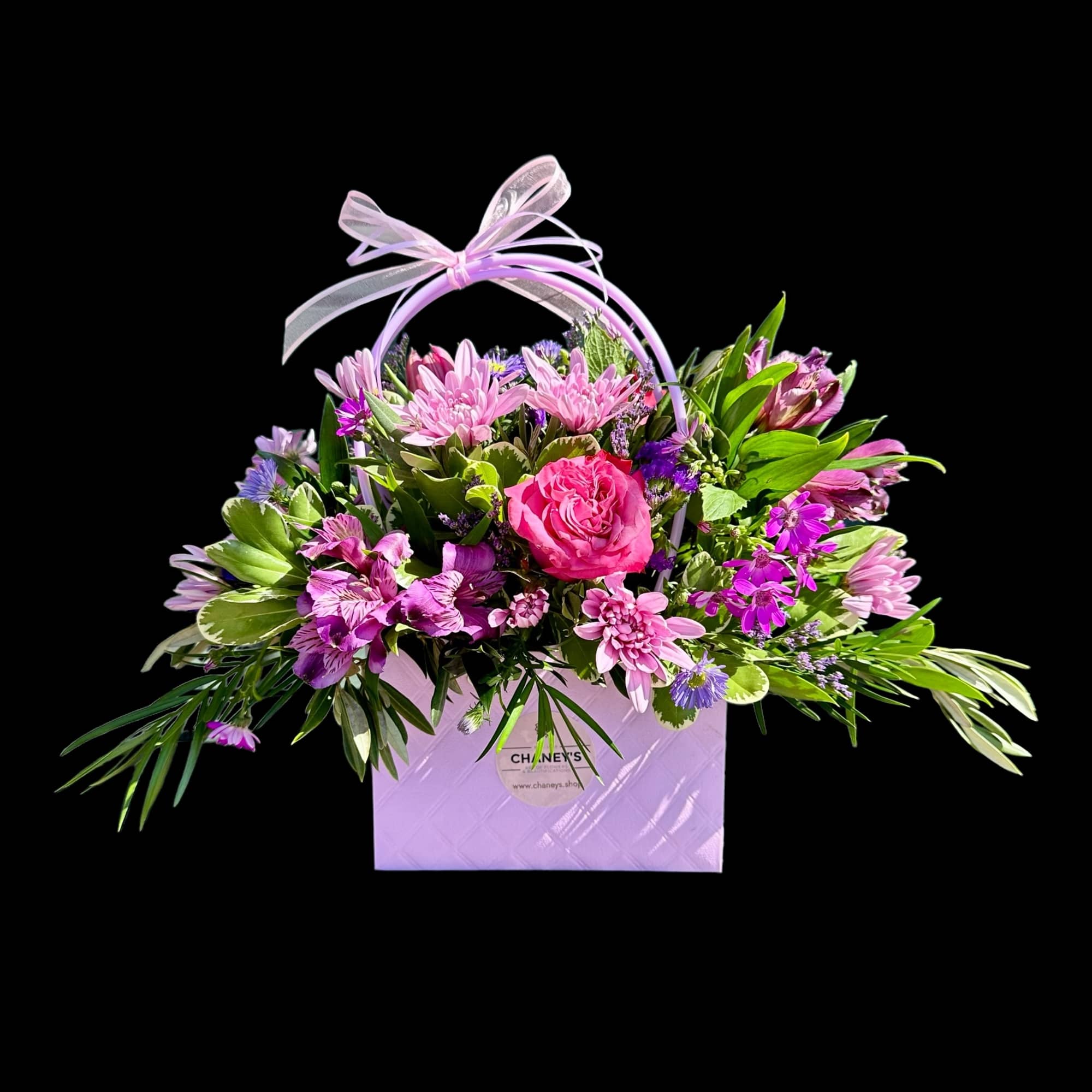 Beautiful fresh cut flower design carefully crafted in correspondence with this purple