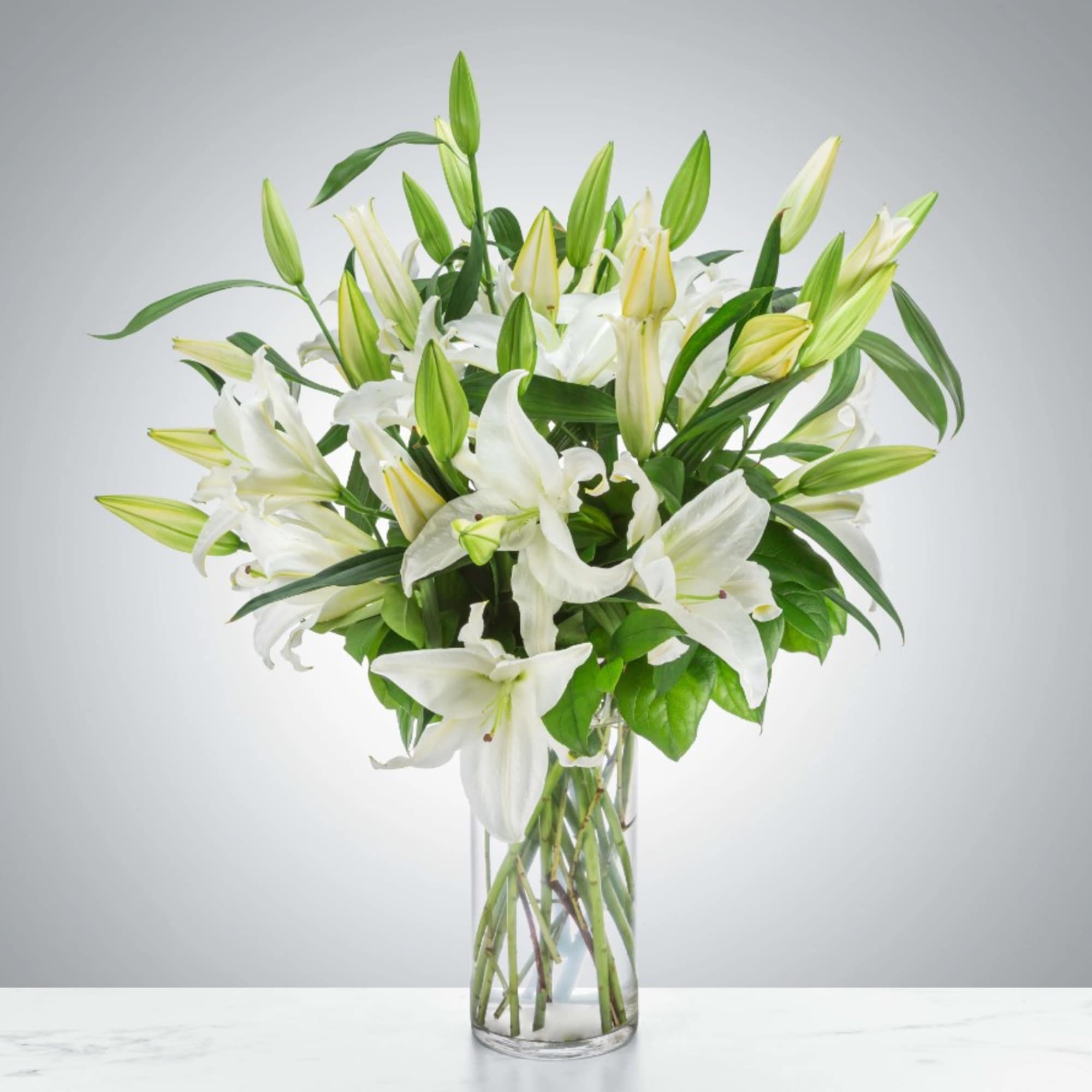 The sophistication and elegance of white lilies are a classic statement for