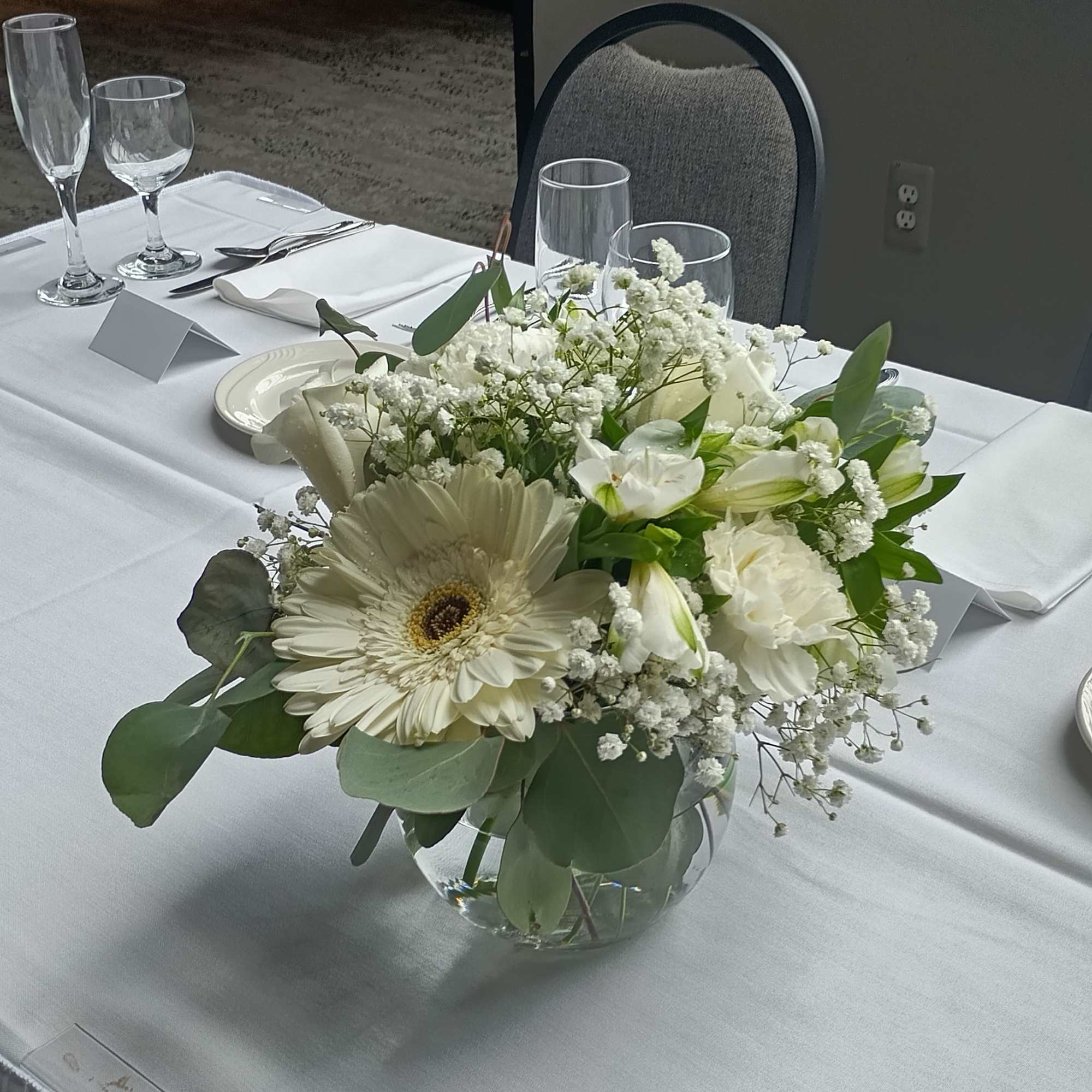 Beautiful genuine white "fish tank" glass container centerpiece with white roses, baby's